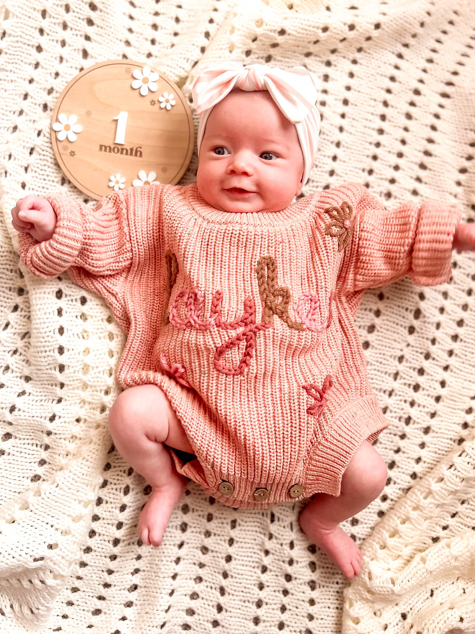 Layken joined the competition — help win amazing prizes! arm, baby, baby_toddler_clothing, cheek, child, dress, face, hand, head, headwear, human_body, iris, lip, pattern, person, pink, skin, sleeve, smile, textile