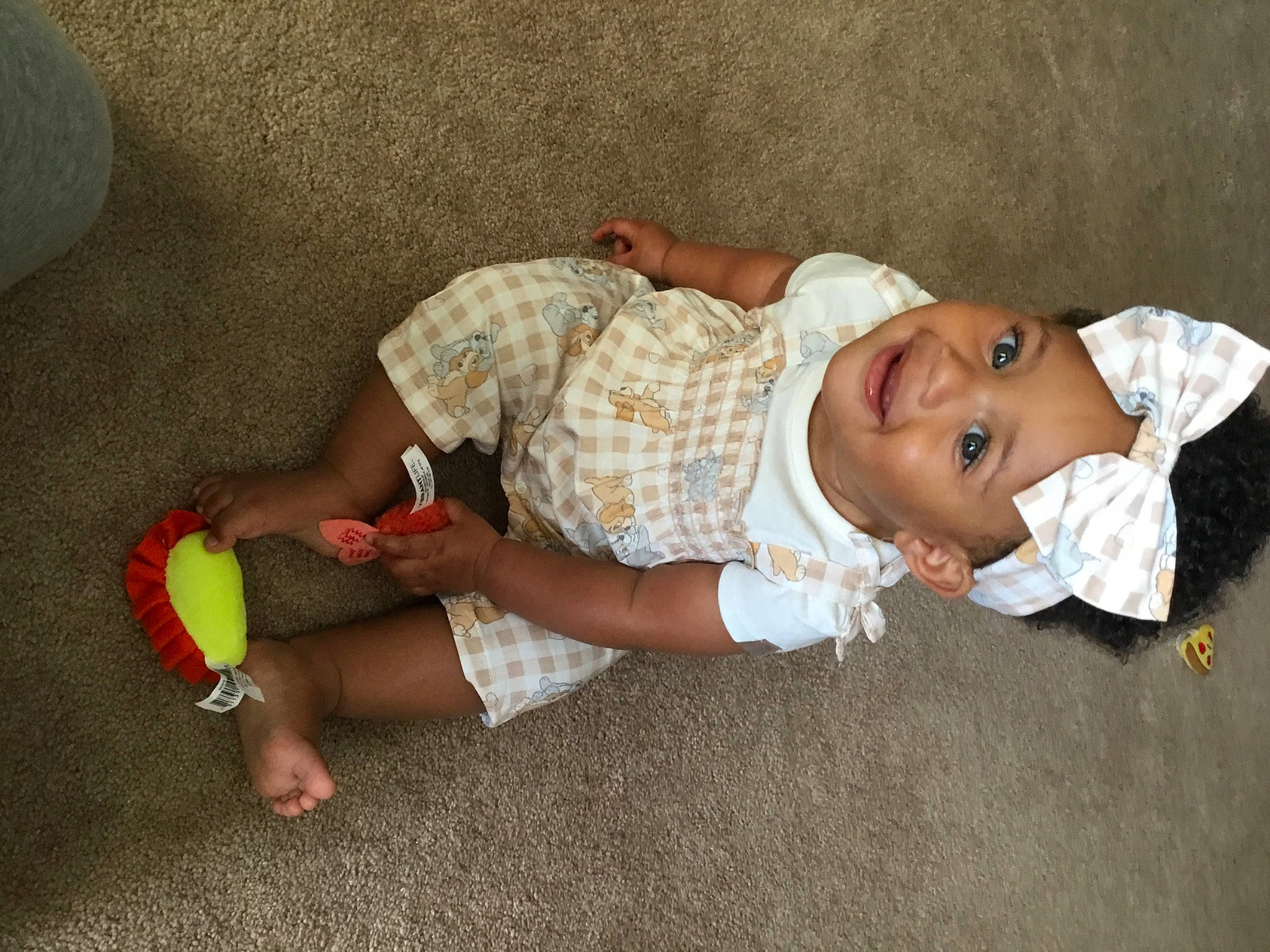 Sapphire joined the competition — help win amazing prizes! baby, baby_toddler_clothing, barefoot, child, comfort, flooring, foot, fun, grass, headwear, human_leg, joy, knee, mammal, person, sitting, skin, sleeve, sock, thigh