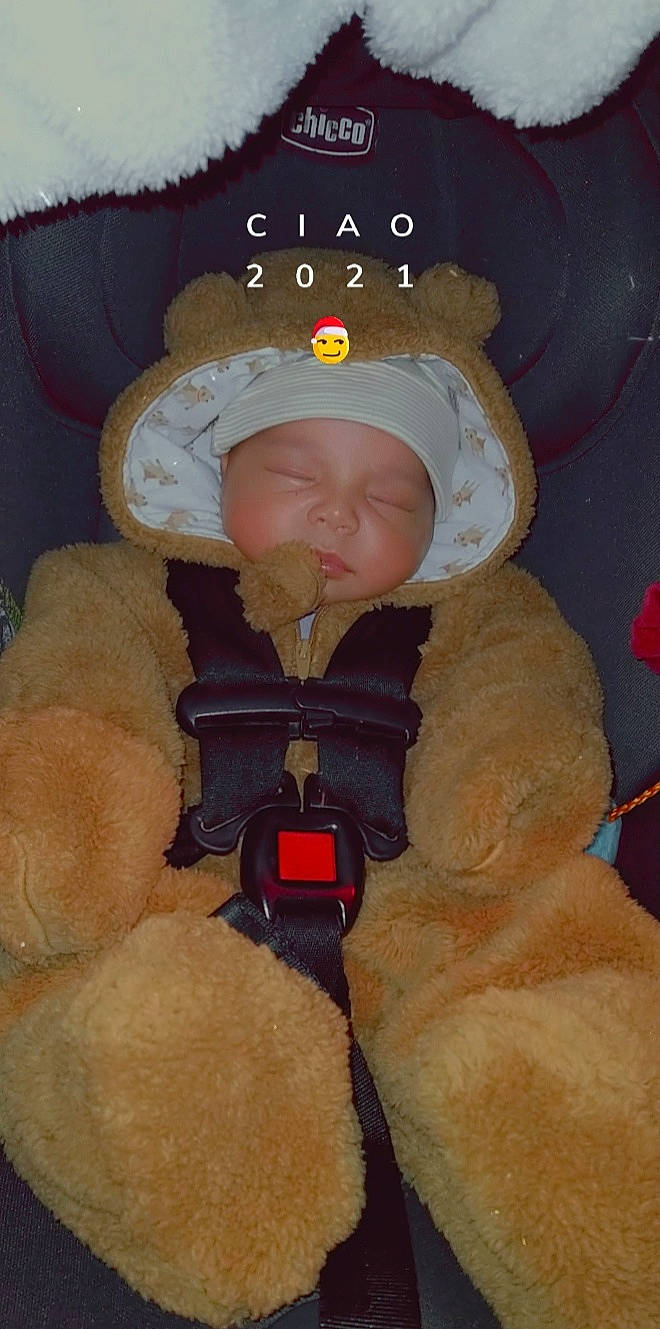 Juelz joined the competition — help win amazing prizes! baby, baby_products, baby_toys, cap, child, costume, costume_hat, eye, fur, hat, head, headwear, helmet, peach, person, personal_protective_equipment, room, stuffed_toy, teddy_bear, textile