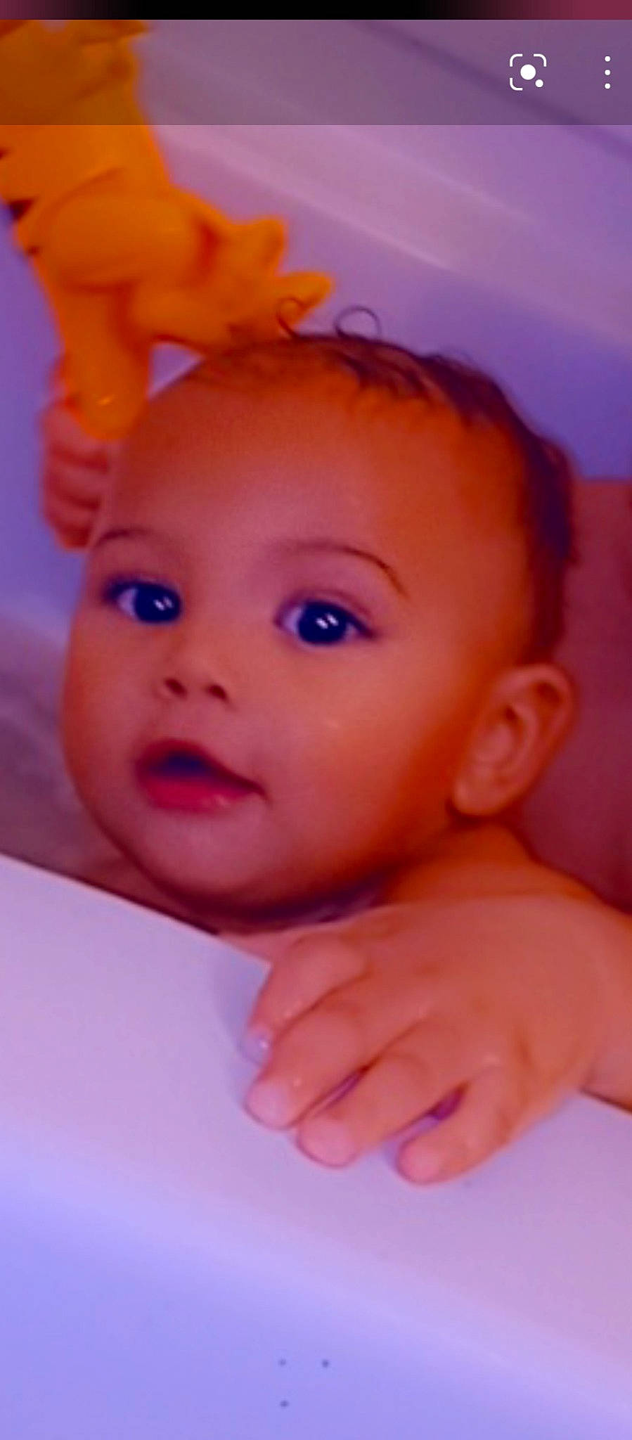 Deion is registered to the contest to win money with this photo: baby, cheek, child, close_up, ear, electric_blue, eyebrow, eyelash, finger, forehead, gesture, happy, human_body, iris, lip, mouth, nose, person, skin, thumb