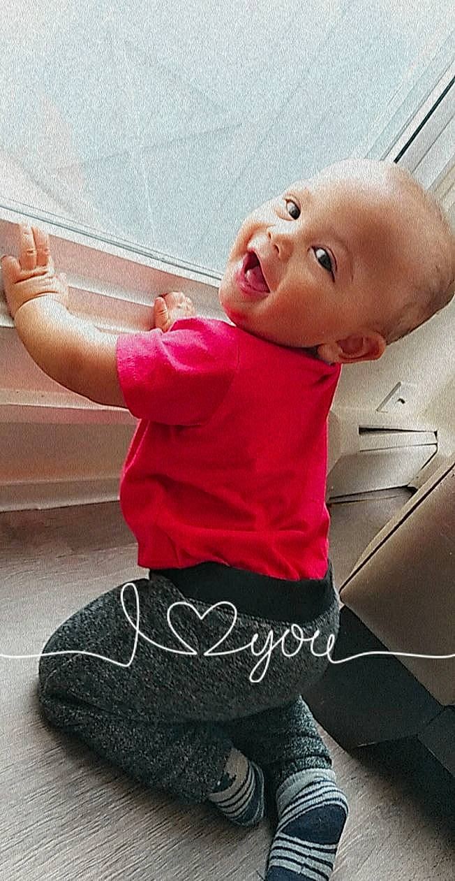 Deion joined the competition — help win amazing prizes! baby, baby_toddler_clothing, child, comfort, elbow, facial_expression, flash_photography, happy, head, knee, leg, magenta, person, pink, skin, sleeve, smile, sock, standing, thigh