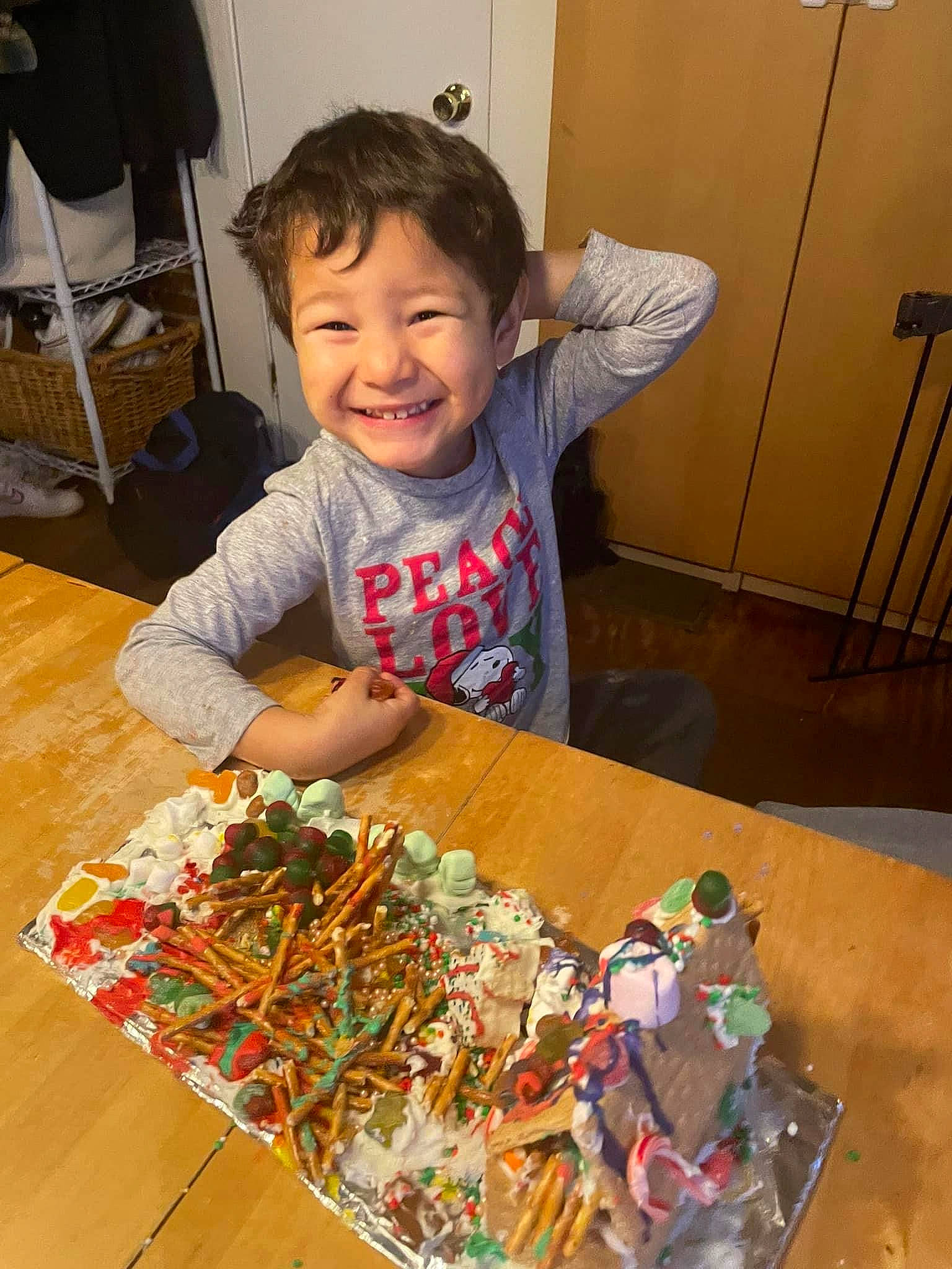 Yamil joined the competition — help win amazing prizes! box, chair, child, comfort_food, event, flooring, fun, games, indoor_games_and_sports, joy, junk_food, person, play, recreation, room, sharing, smile, t_shirt, table, toddler