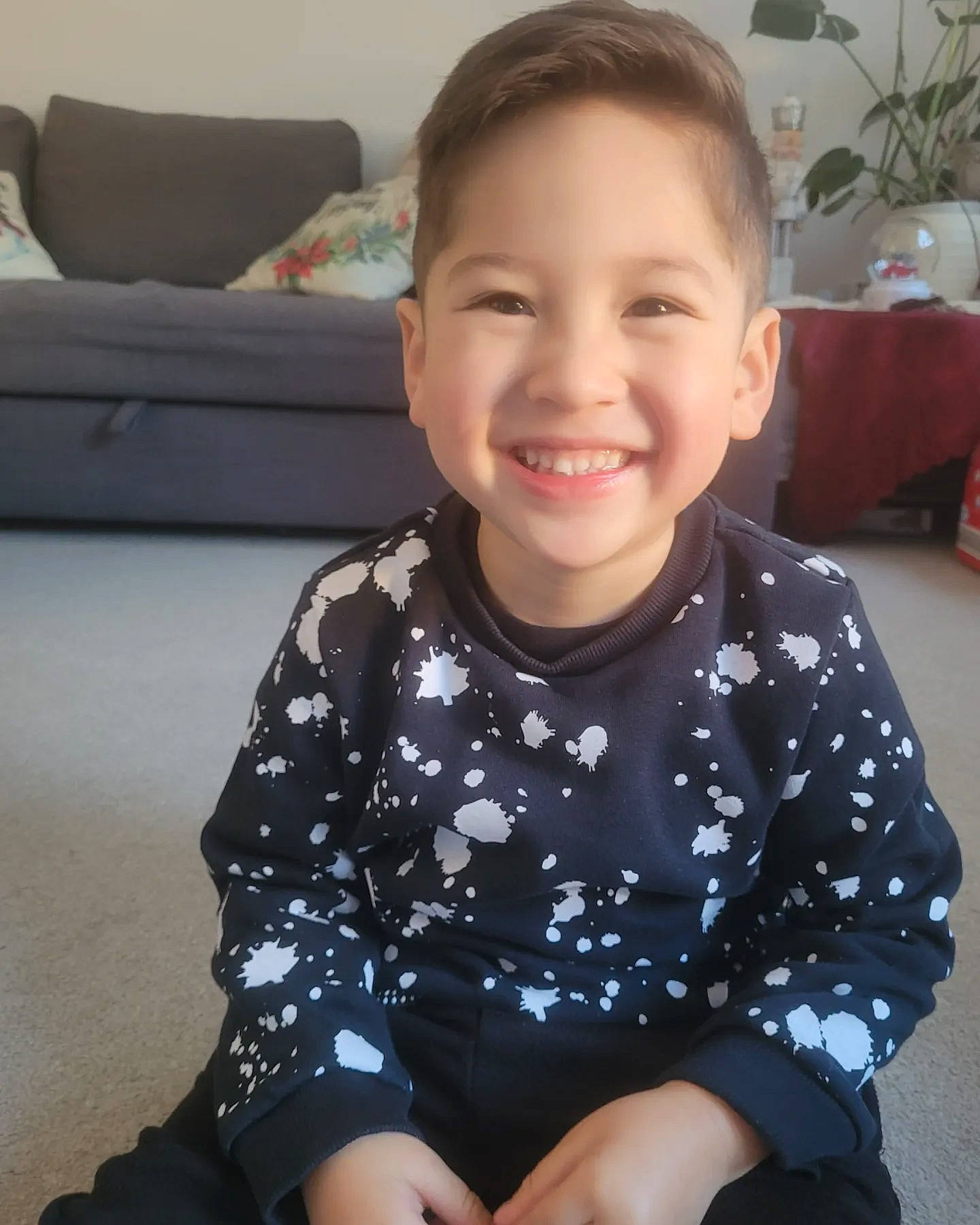 Rafael is registered to the contest to win money with this photo: baby_toddler_clothing, cheek, chin, eye, face, hair, happy, head, houseplant, iris, joy, lip, neck, nose, person, plant, shoulder, skin, sleeve, smile