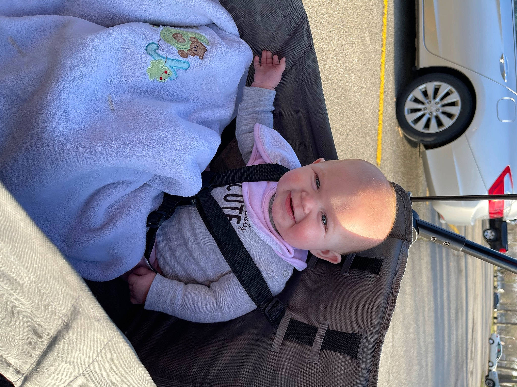 Adaline is registered to the contest to win money with this photo: auto_part, automotive_exterior, automotive_lighting, automotive_tire, automotive_wheel_system, baby, baby_products, baby_toddler_clothing, car, child, family_car, hat, motor_vehicle, person, rim, smile, tire, toddler, vehicle, vehicle_door