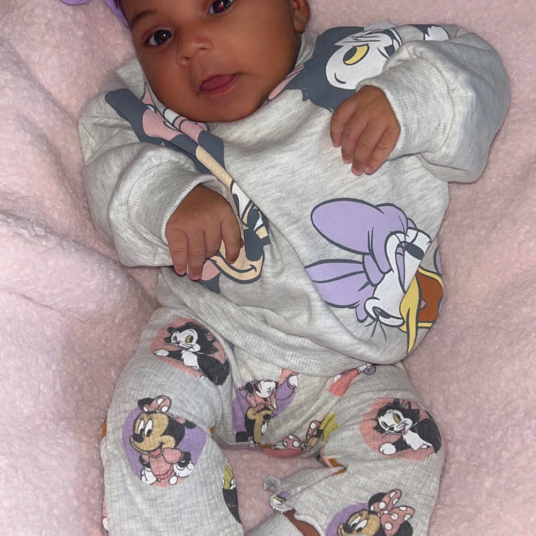 Alaiyah joined the competition — help win amazing prizes! accessories, baby, bed, blanket, bodypart, bonnet, clothing, face, finger, furniture, hand, hat, head, hosiery, newborn, pajamas, person, photography, portrait, sock
