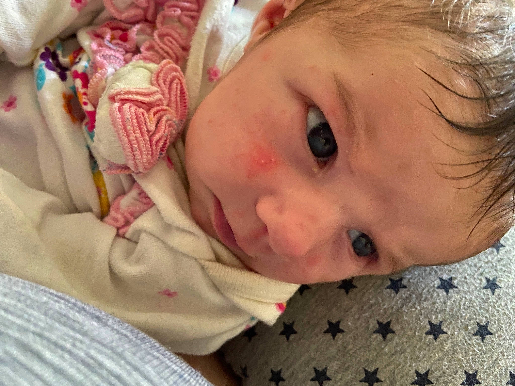 Jeannette is registered to the contest to win money with this photo: baby, bedtime, cheek, child, close_up, ear, eye, face, head, iris, lip, mouth, nose, person, skin, toddler