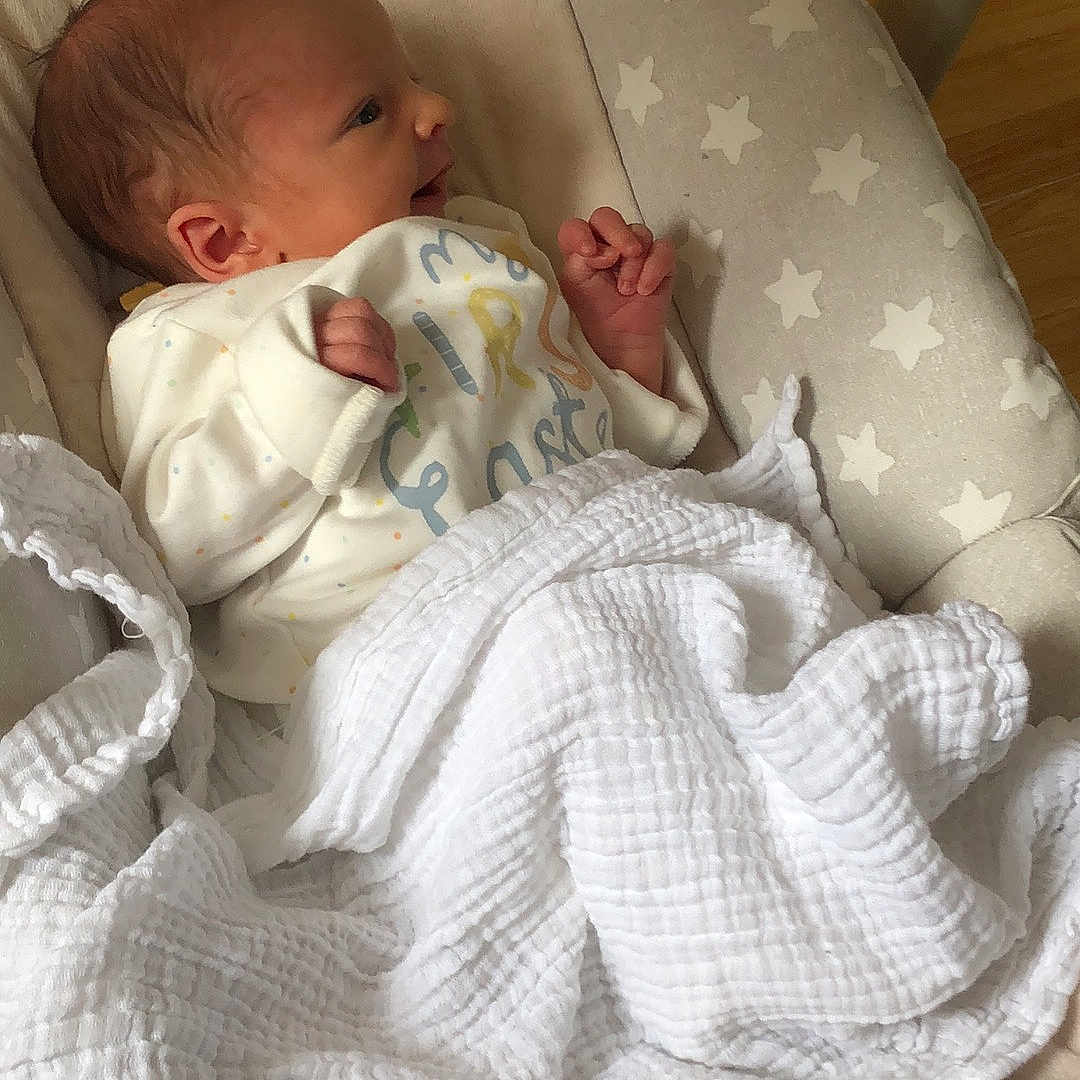 Michael joined the competition — help win amazing prizes! baby, bed, blanket, couch, cradle, crib, cushion, face, furniture, head, homedecor, infantbed, linen, newborn, person, photography, pillow, portrait, quilt, sleeping