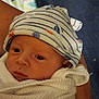 Brayzen is registered to the contest to win money with this photo: arm, baby, blanket, child, closeup, cozy, cute, eyes, face, hat, indoor, infant, newborn, newborn_baby, person, resting, sleepy, soft, striped_hat, wrapped