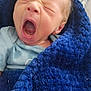 baby, infant, yawning, blanket, blue_blanket, cozy, sleepy, newborn, cute, face, mouth_open, eyes_closed, soft_texture, clothing, lying_down, indoors, closeup, head, skin, person