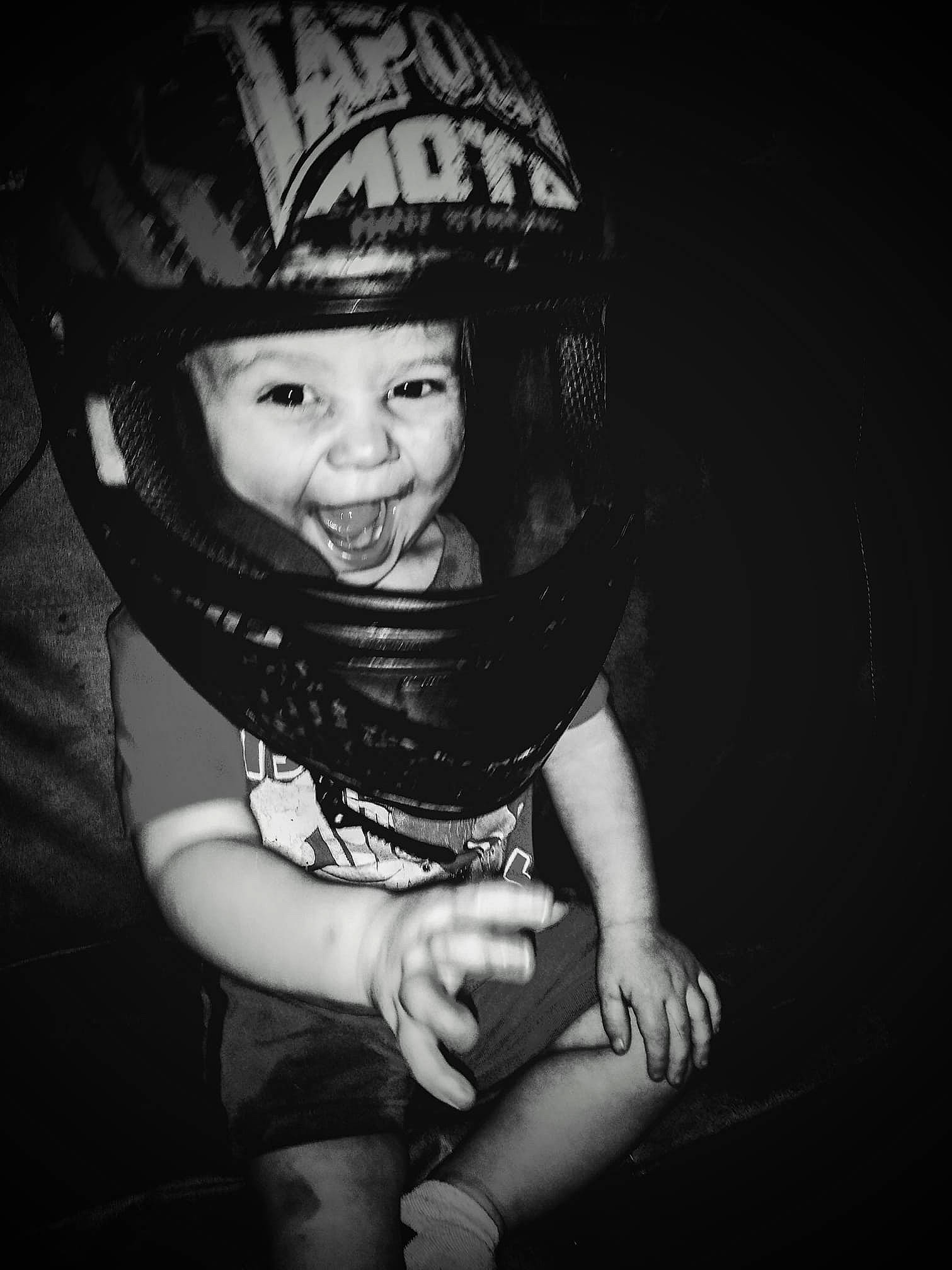 Dallas joined the competition — help win amazing prizes! black, black_and_white, child, cool, flash_photography, fun, headgear, headwear, helmet, monochrome, monochrome_photography, person, personal_protective_equipment, photography, portrait, portrait_photography, smile, stock_photography, style, toddler