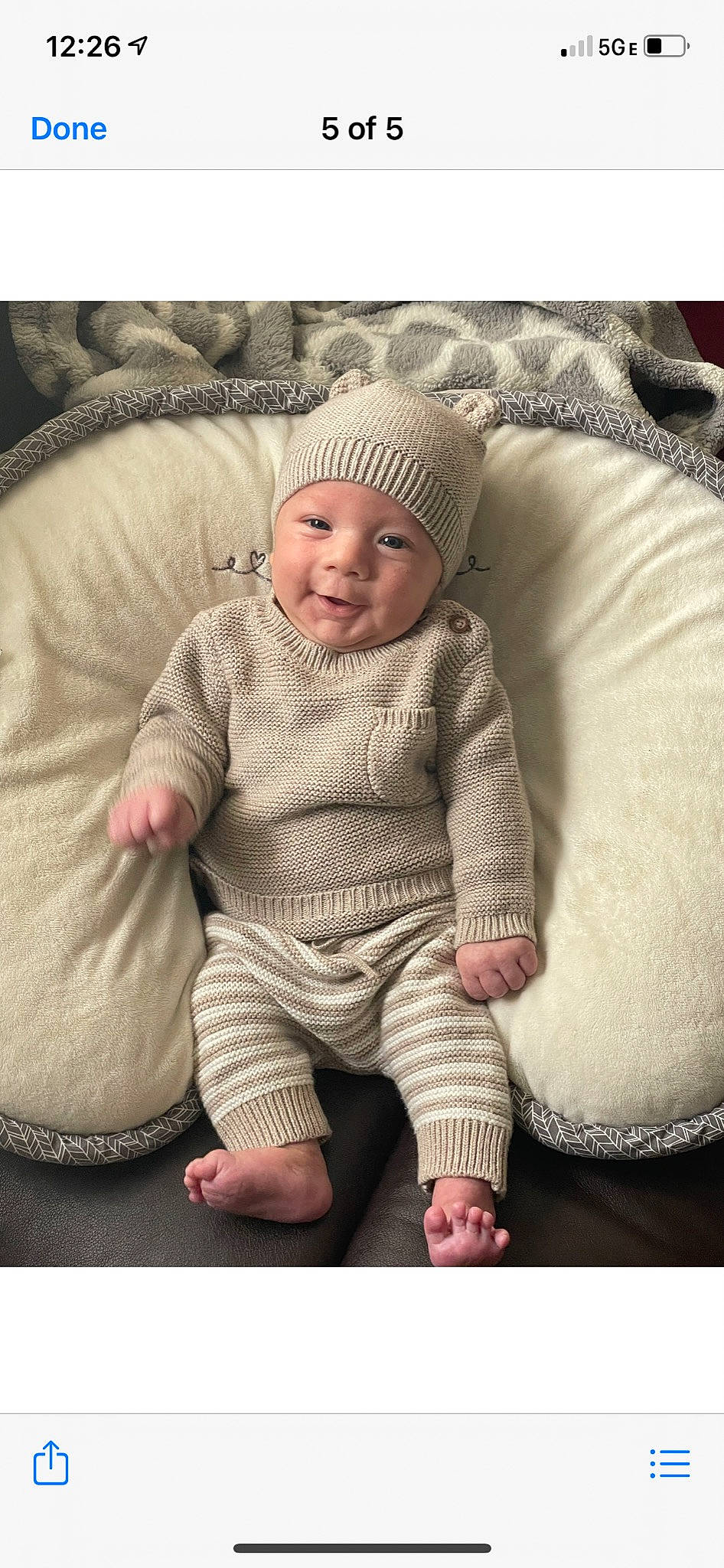 Pierce joined the competition — help win amazing prizes! baby, baby_toddler_clothing, cap, cheek, child, comfort, eye, fur, gesture, happy, head, headwear, knit_cap, linens, pattern, person, sitting, sleeve, smile, toddler