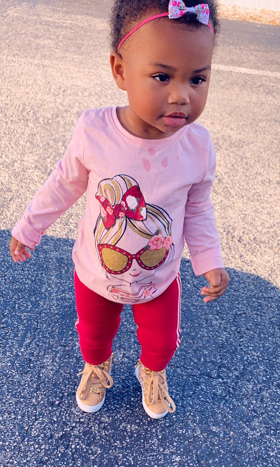 Kennedy joined the competition — help win amazing prizes! baby, baby_toddler_clothing, child, clothing, footwear, pajamas, person, pink, play, product, shoe, skin, sleeve, smile, t_shirt, toddler