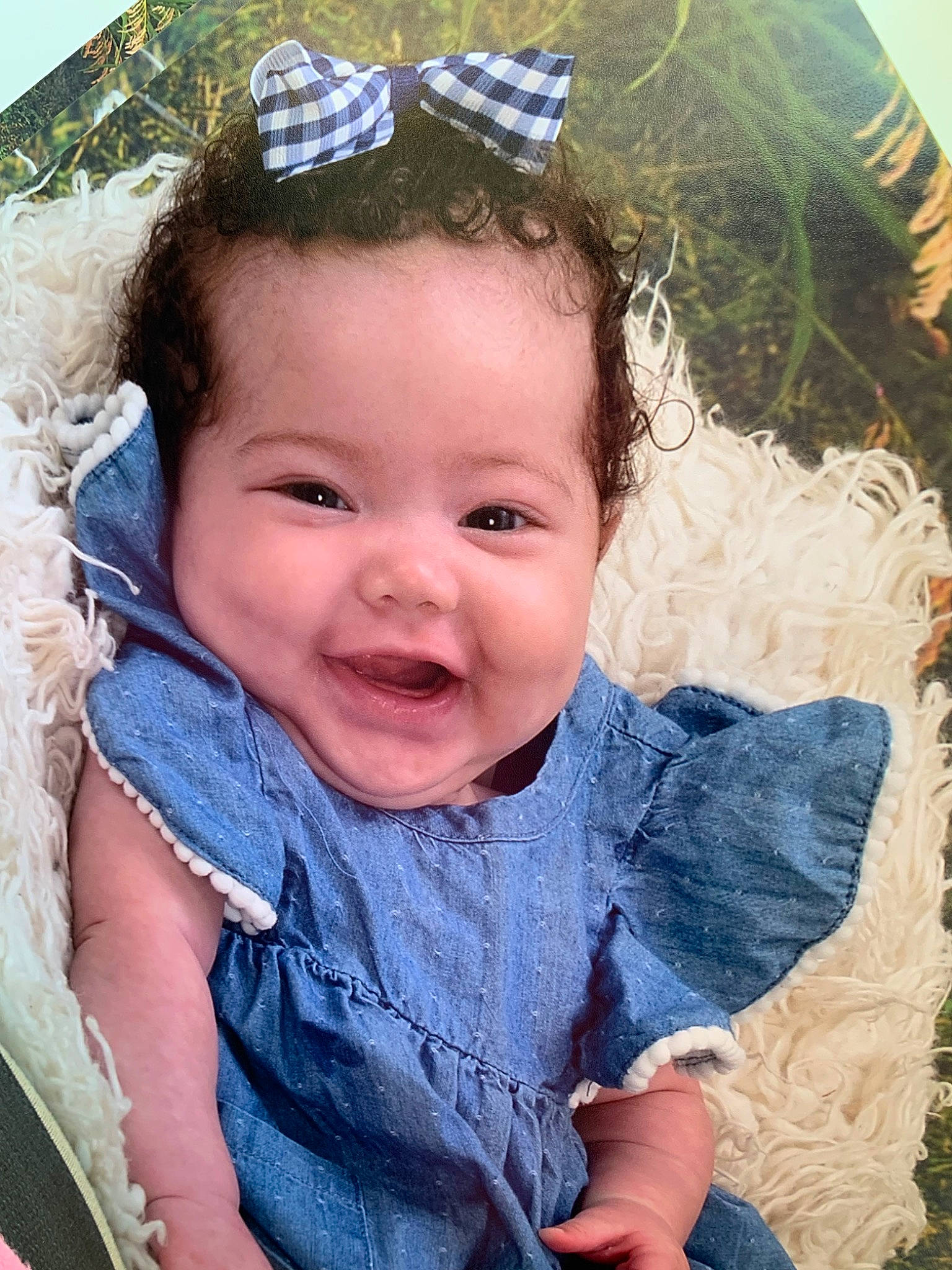 Kallie is registered to the contest to win money with this photo: baby, cheek, child, chin, cool, eye, face, facial_expression, forehead, hair_accessory, head, headgear, iris, leaf, lip, nose, outerwear, person, skin, smile