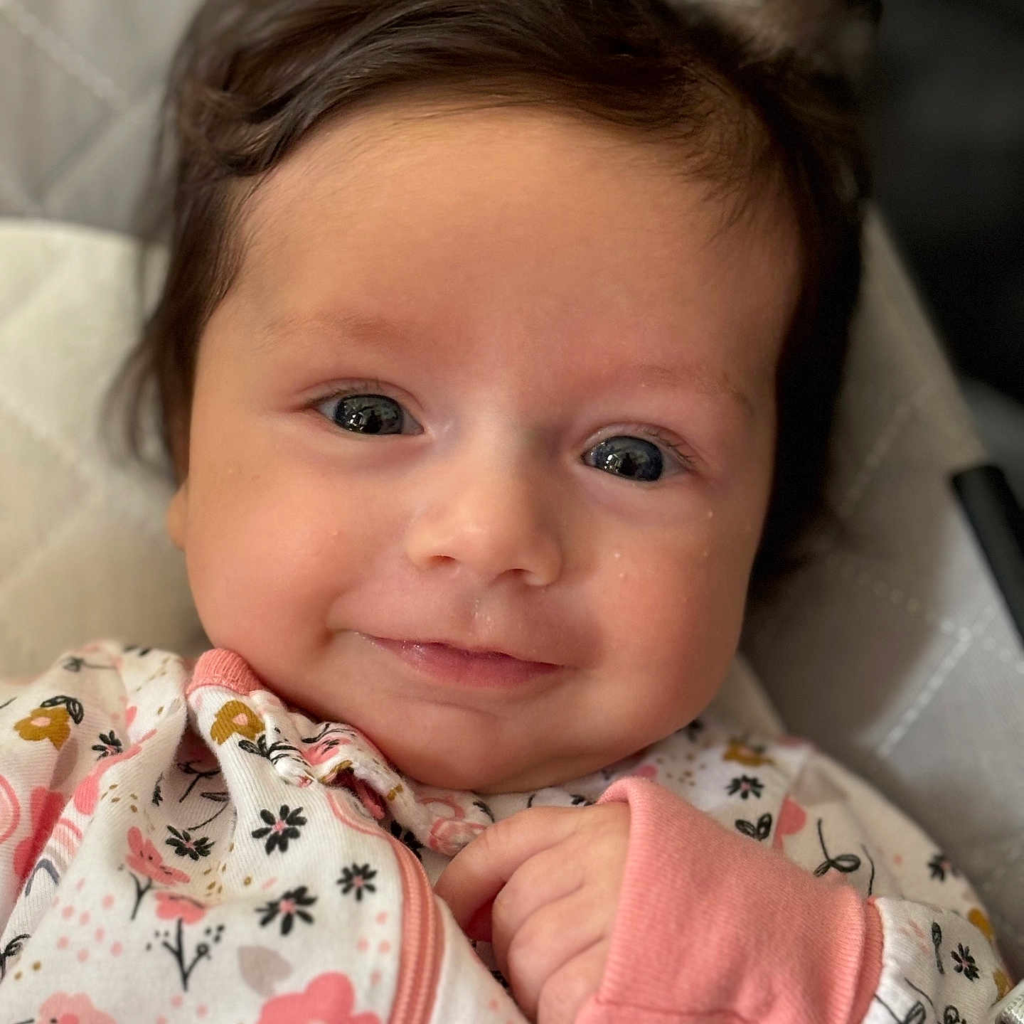 Sophia is registered to the contest to win money with this photo: architecture, baby, blanket, bodypart, clothing, coat, cushion, face, finger, hand, happy, head, homedecor, jacket, newborn, person, photography, portrait, quilt, smile