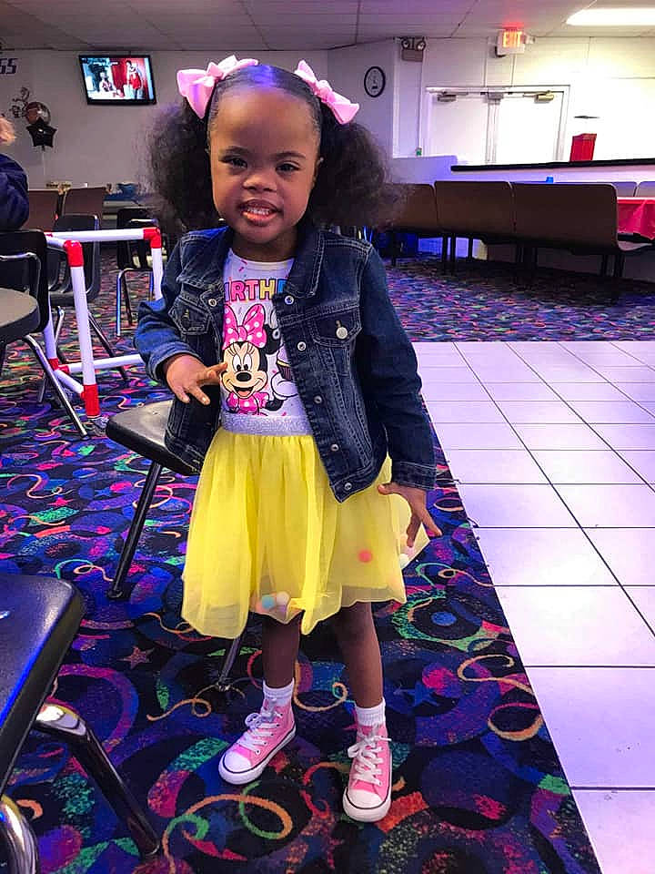 Taryn is registered to the contest to win money with this photo: child, child_model, footwear, fun, person, play, purple, shoe, smile, toddler