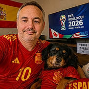 Pala participe au concours pour gagner de l'argent avec cette photo : casual, celebration, dog, fifa_world_cup, flag, happy, home_interior, indoor, man, pet, photography, portrait, red_clothing, smiling, soccer_ball, soccer_jersey, spain_flag, sports_fan, trophy, tv_screen