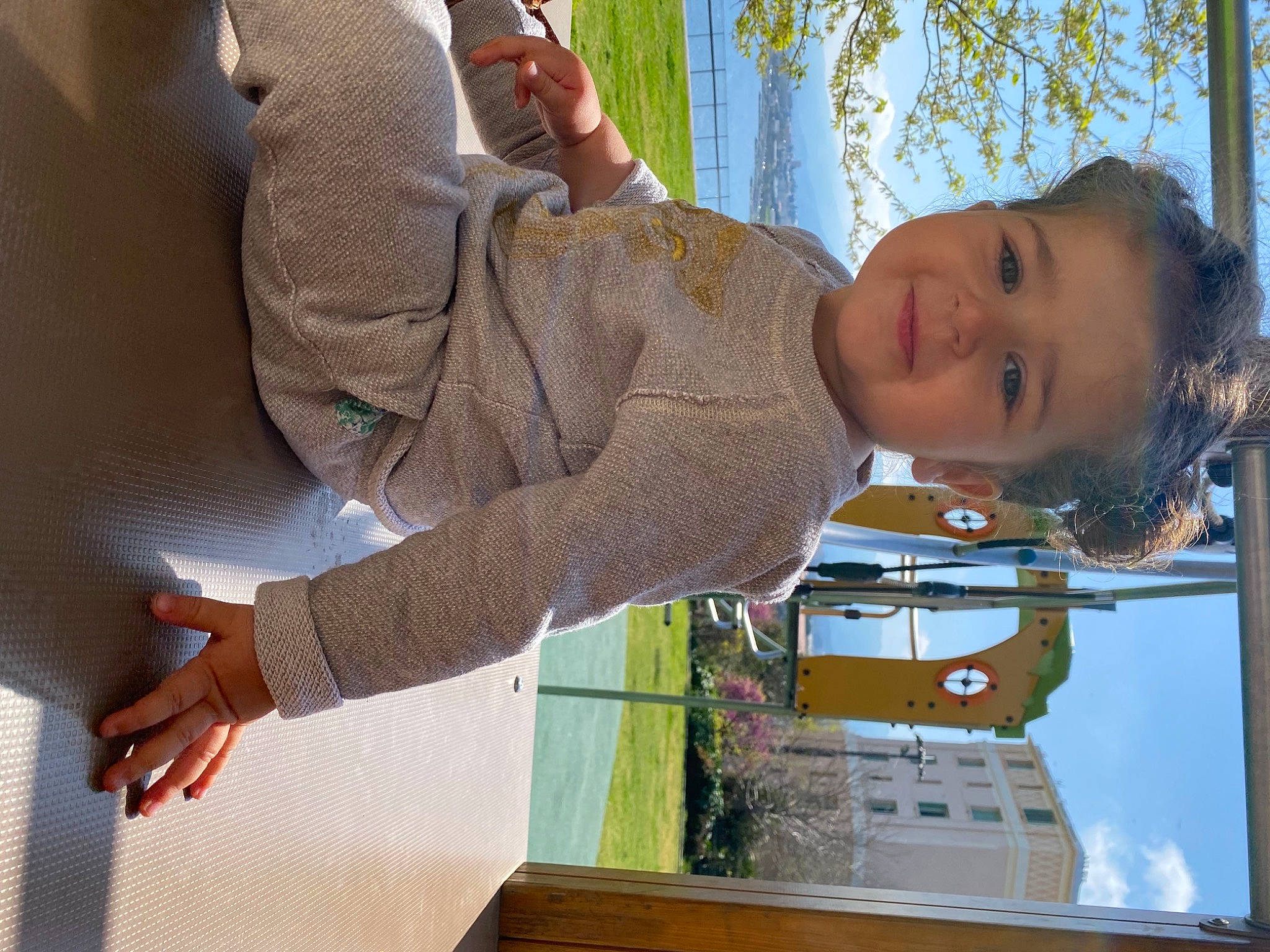 Vanessa participe au concours pour gagner de l'argent avec cette photo : child, elbow, fun, gesture, happy, hat, human_leg, joy, leisure, person, reflection, sitting, sky, thigh, toddler, tree, vacation, waist, water, window