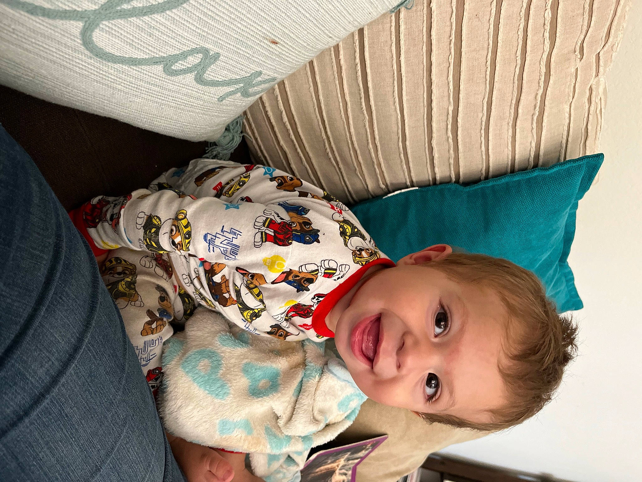 Marcus joined the competition — help win amazing prizes! baby, baby_products, baby_sleeping, baby_toddler_clothing, cheek, child, comfort, happy, linens, pattern, person, room, sitting, smile, textile, throw_pillow, toddler, wood