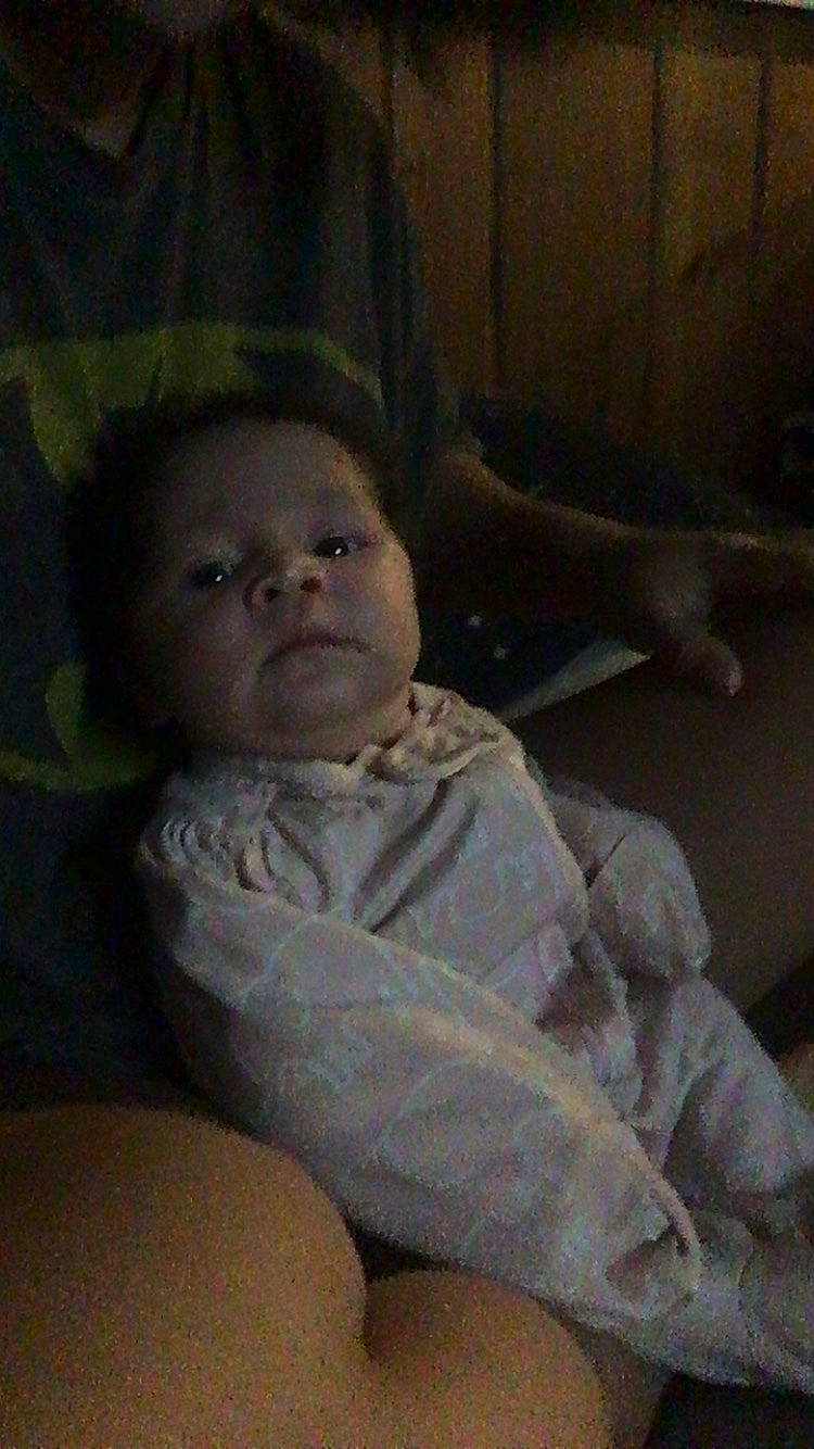 Xenia is registered to the contest to win money with this photo: baby, baby_products, baby_toddler_clothing, cheek, child, chin, comfort, elbow, iris, mouth, nose, person, room, sitting, skin, toddler