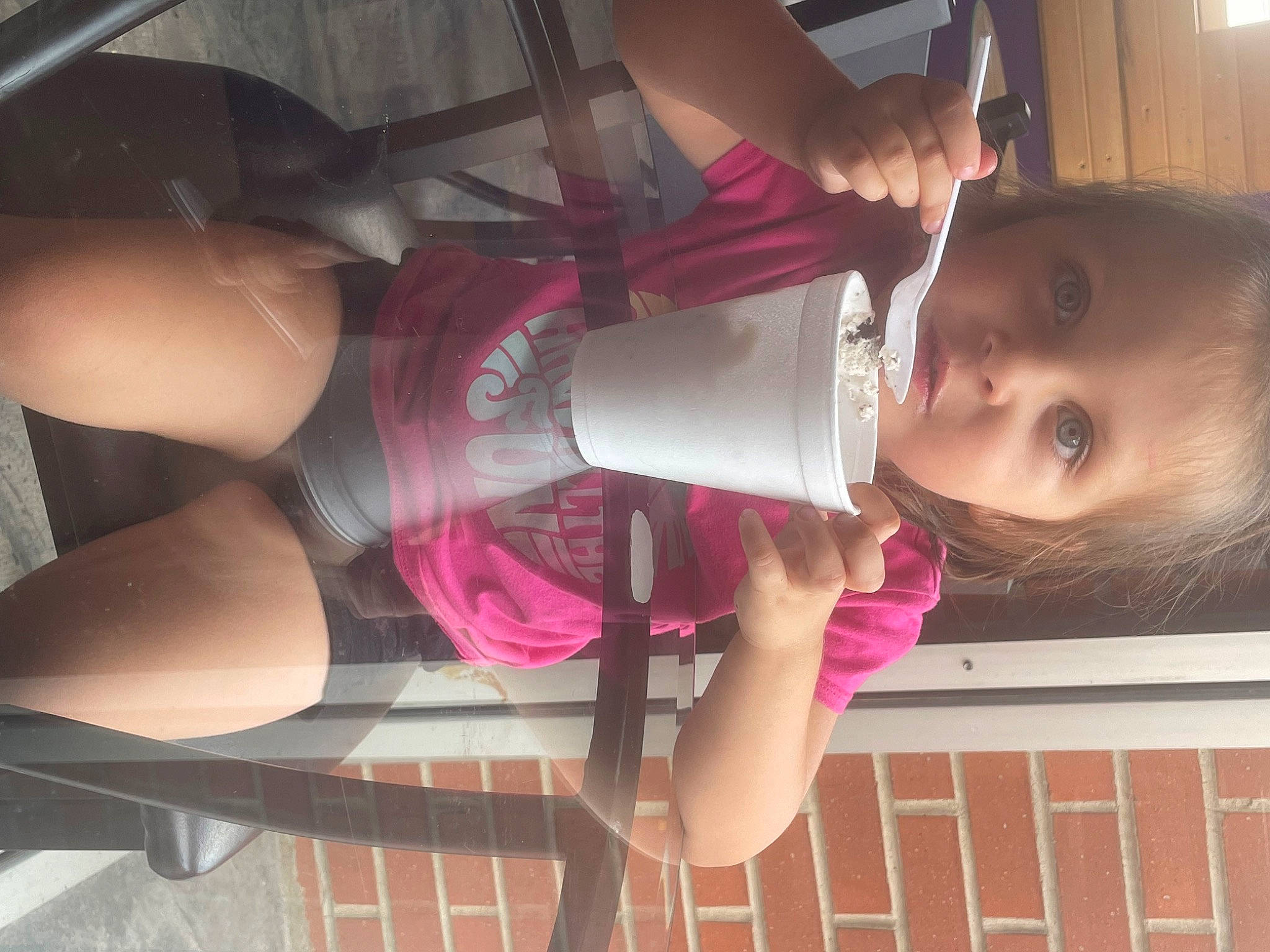 Emma Grace is registered to the contest to win money with this photo: arm, beauty, carmine, chest, drinking, drinkware, elbow, food, foot, human_leg, joint, knee, magenta, person, pink, skin, snapshot, thigh, toddler, waist