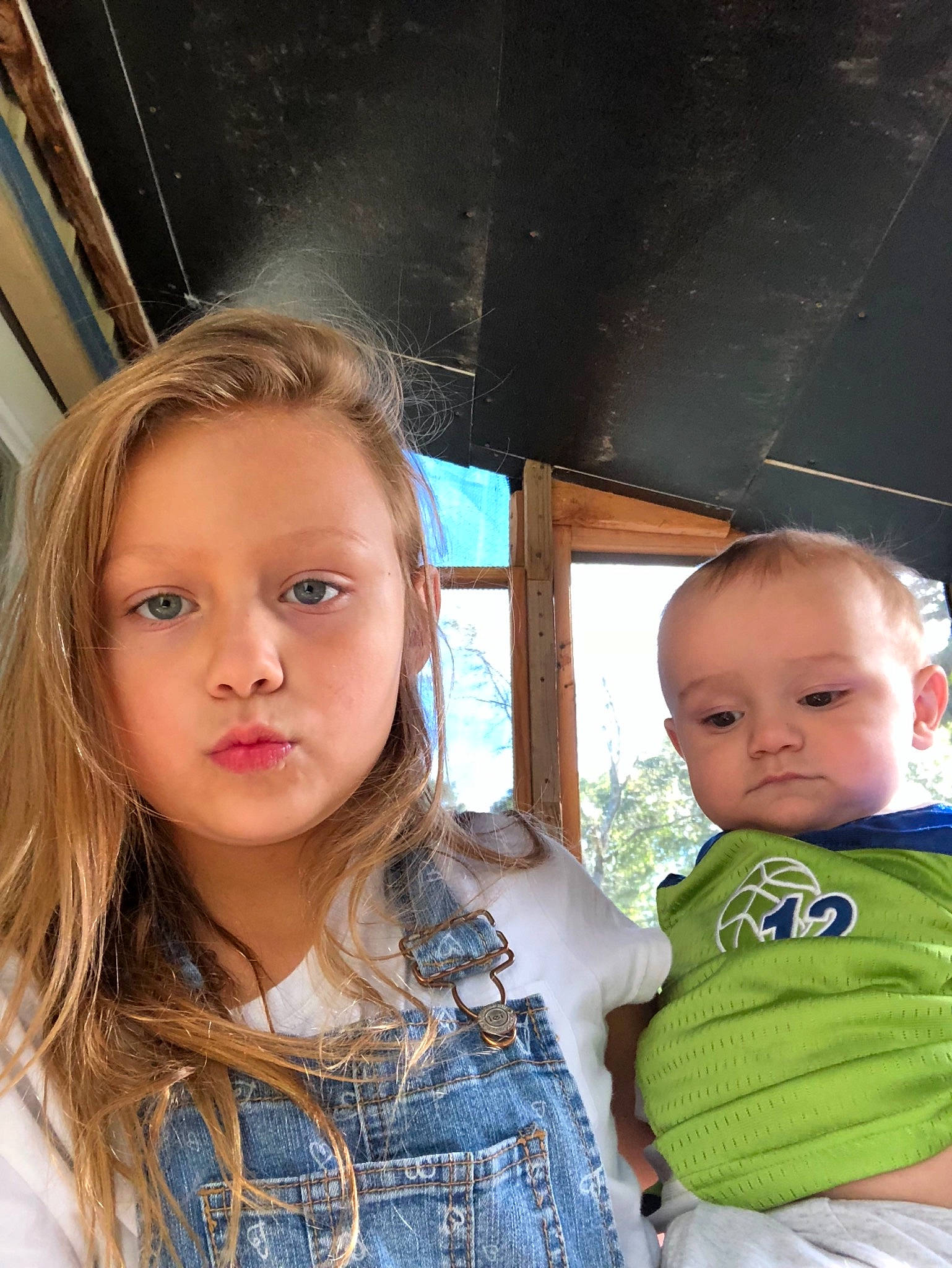 Kylee Jo is registered to the contest to win money with this photo: blond, cheek, child, chin, daughter, eye, face, fun, iris, neck, nose, person, photography, sibling, skin, smile, toddler, vacation