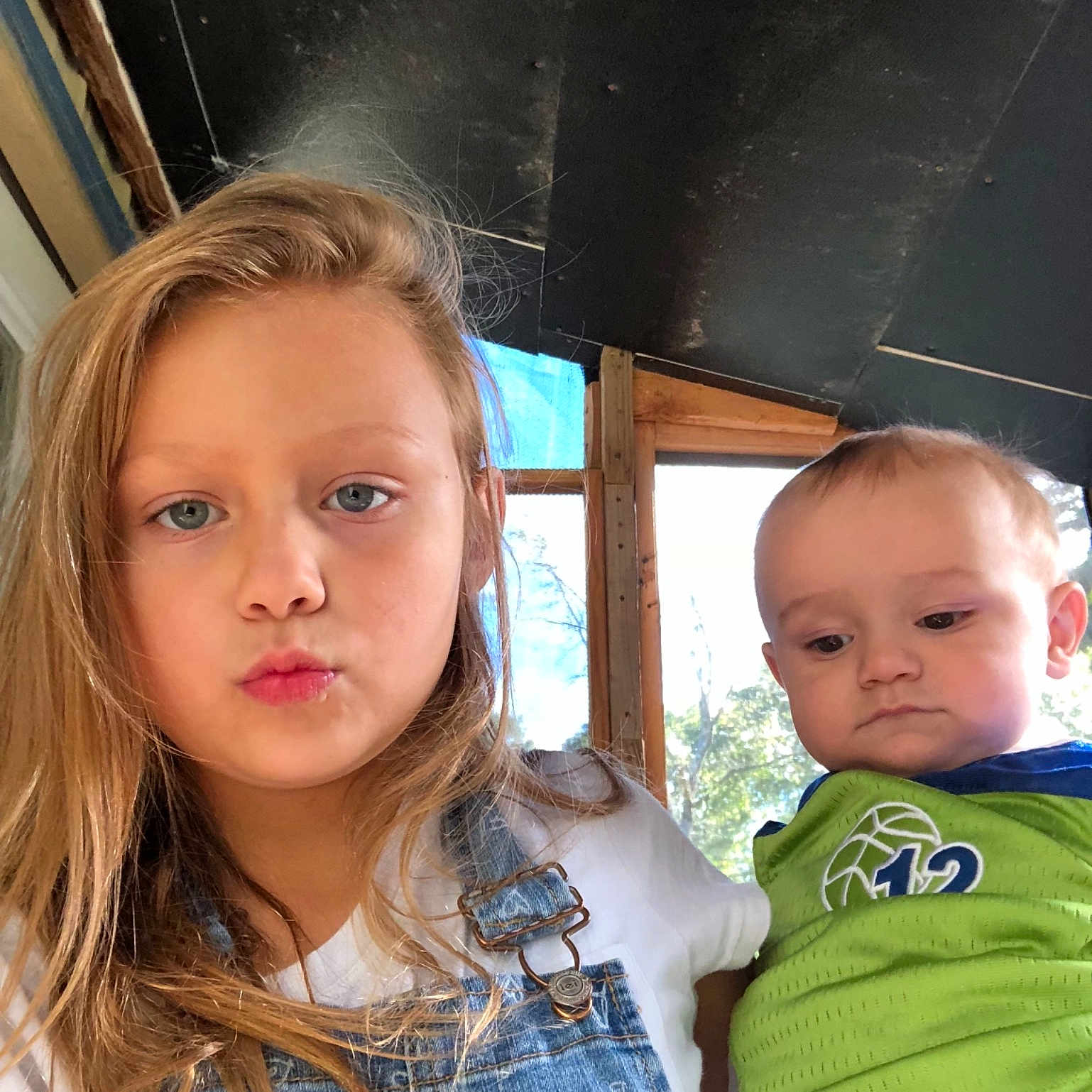 Kylee Jo is registered to the contest to win money with this photo: blond, cheek, child, chin, daughter, eye, face, fun, iris, neck, nose, person, photography, sibling, skin, smile, toddler, vacation