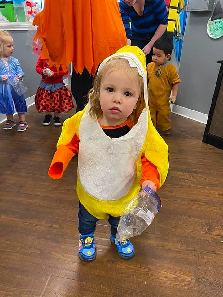 Aspen joined the competition — help win amazing prizes! baby, baby_toddler_clothing, child, clothing, costume, event, floor, flooring, fun, fur, happy, hardwood, leisure, orange, outerwear, person, play, t_shirt, toddler, wood