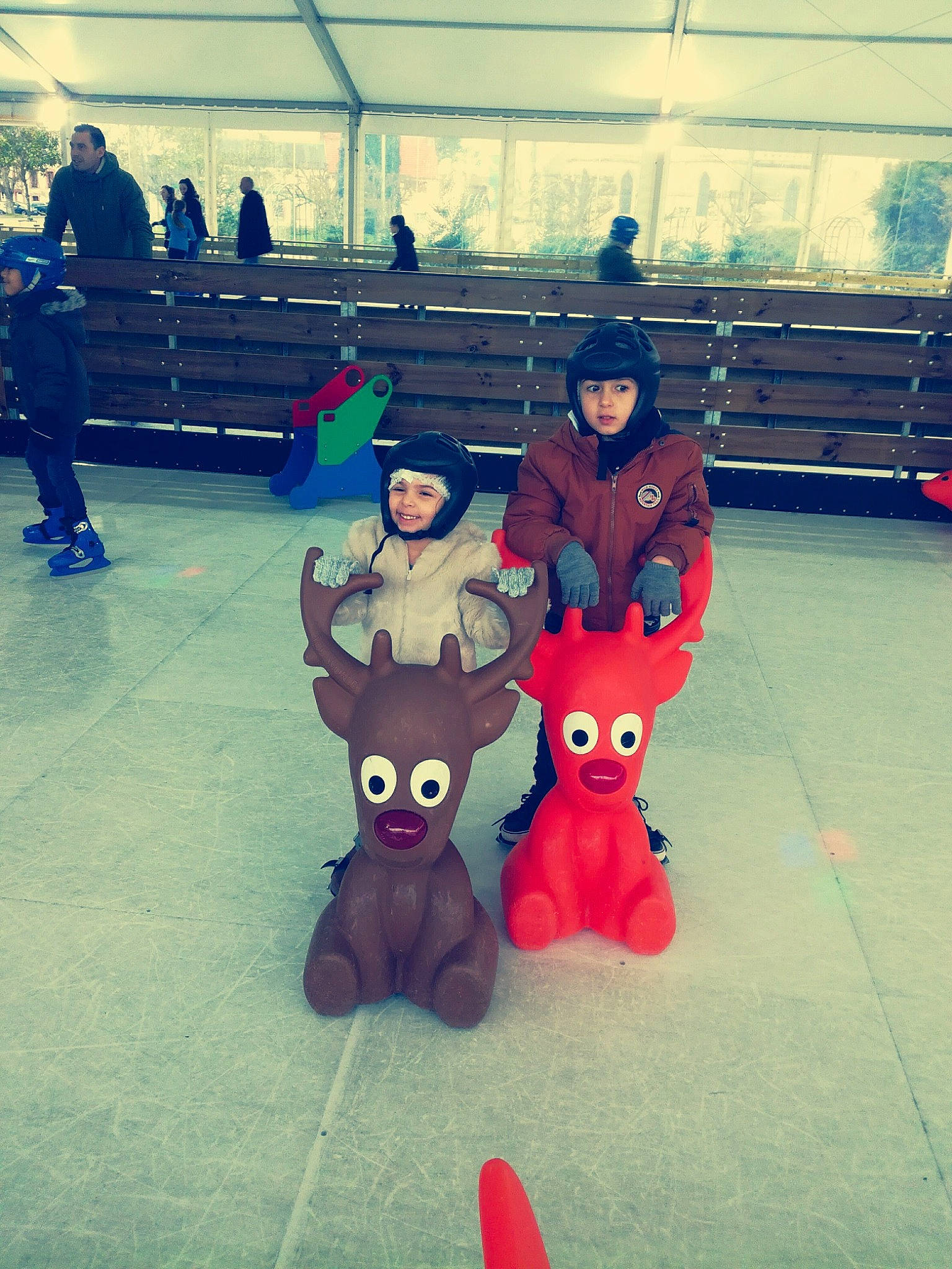 Mylla participe au concours pour gagner de l'argent avec cette photo : animated_cartoon, carmine, child, cool, electric_blue, fence, flooring, fun, happy, headwear, joy, leisure, mammal, mascot, metal, person, recreation, red, shoe, sitting