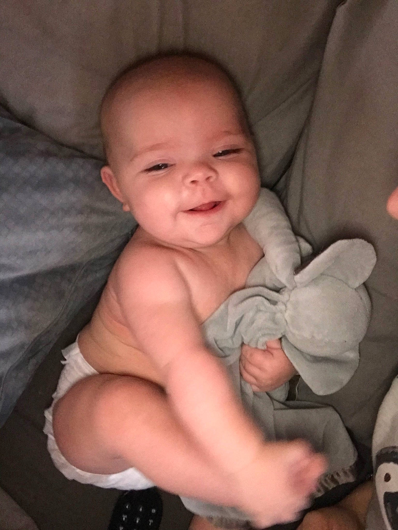 Chloe is registered to the contest to win money with this photo: arm, baby, cheek, child, eye, face, facial_expression, finger, hand, head, leg, lip, muscle, nose, person, sitting, skin, smile, thumb, toddler