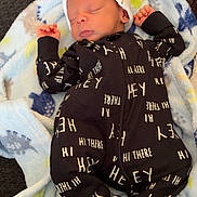 Zeovoni joined the competition — help win amazing prizes! baby, blanket, child, clothing, couch, cozy, cute, fabric, face, footed_pajamas, headwear, indoor, infant, newborn, onesie, patterned_clothing, peaceful, resting, sleeping, soft