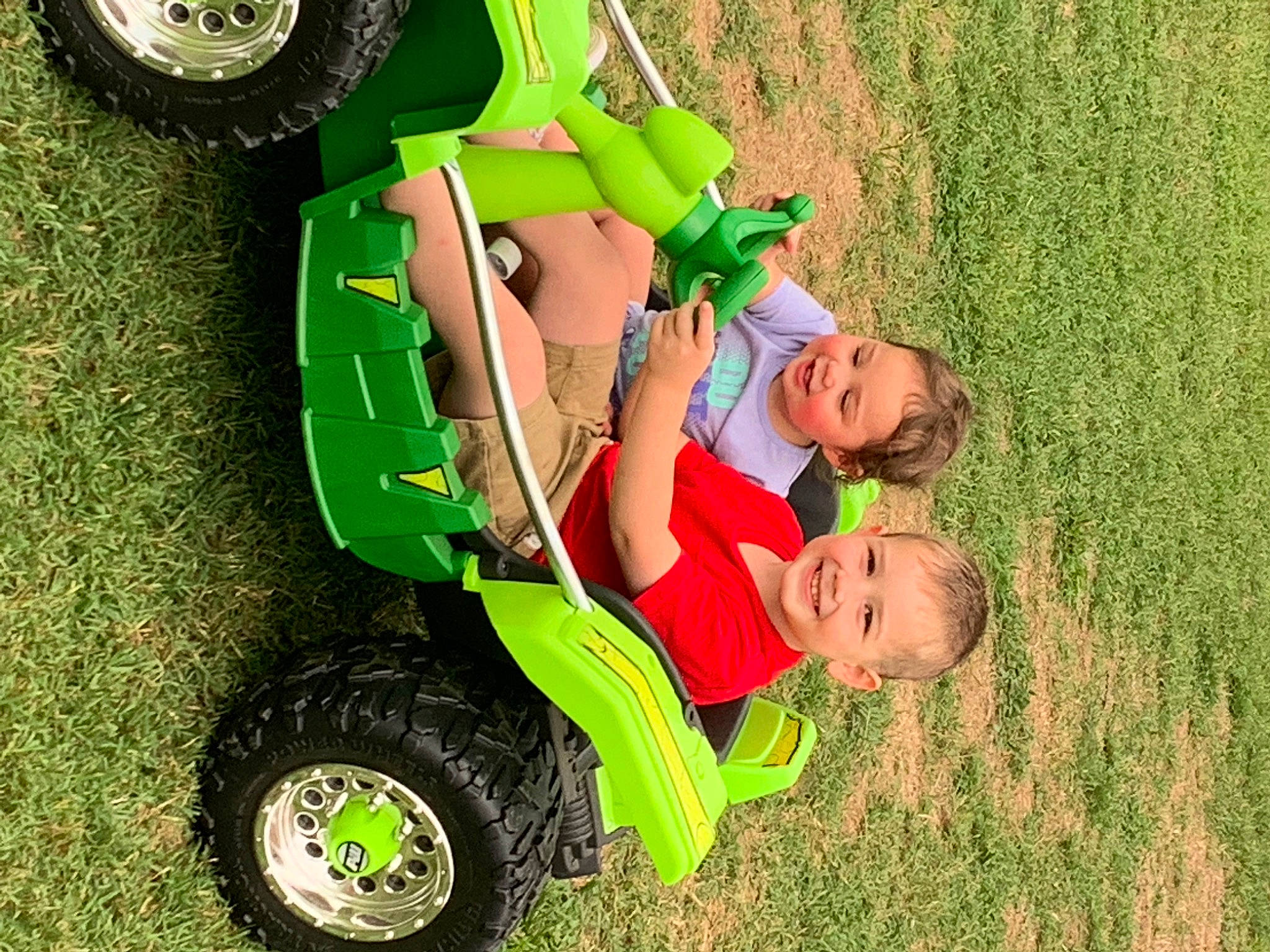 Ezrah Emiliano is registered to the contest to win money with this photo: automotive_design, automotive_tire, automotive_wheel_system, fun, grass, grassland, green, happy, joy, lawn, leisure, motor_vehicle, people_in_nature, person, plant, recreation, tire, toddler, toy, tree