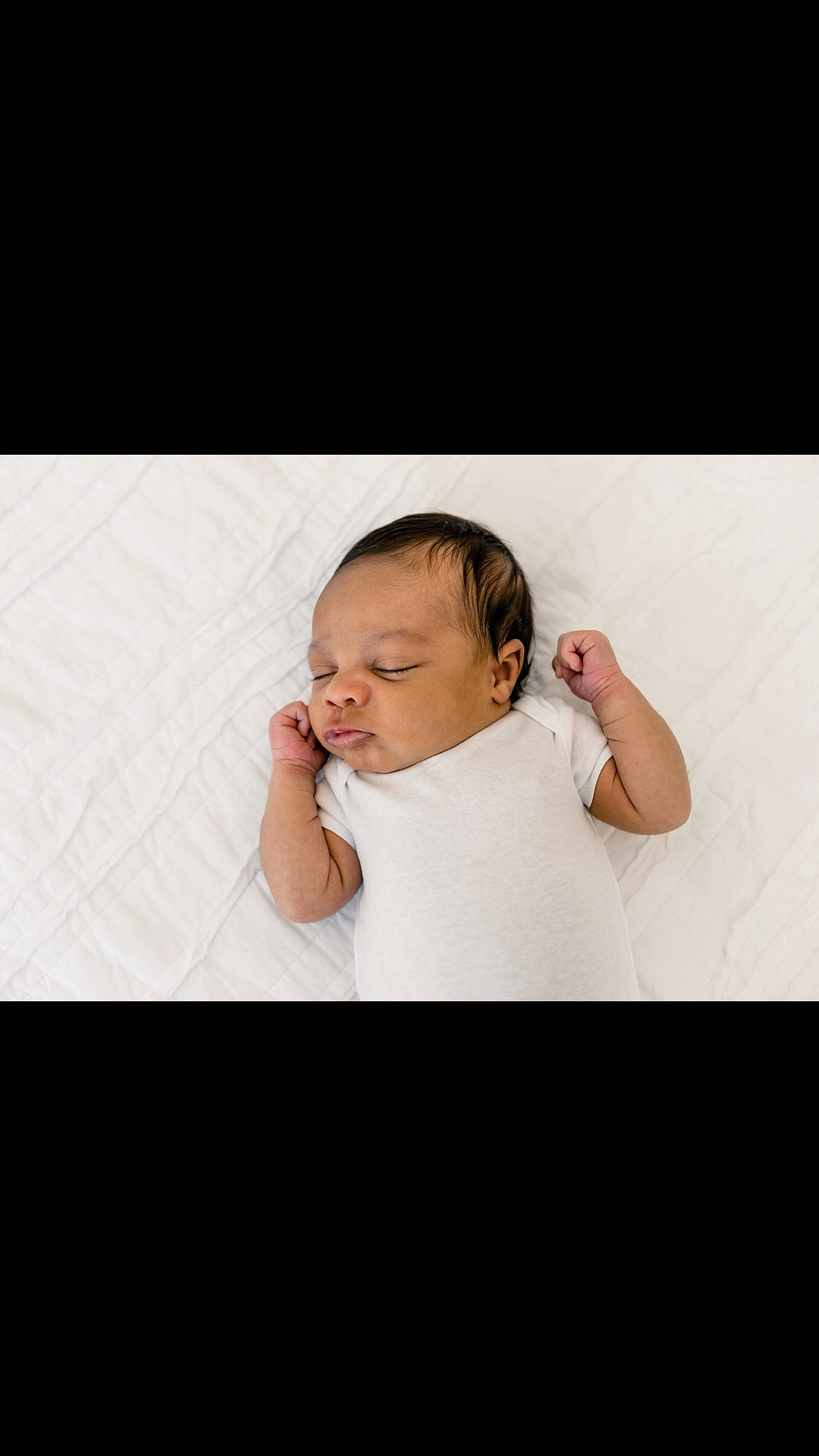 Jaylon is registered to the contest to win money with this photo: arm, baby, cheek, child, chin, ear, eye, face, hand, head, neck, nose, person, photograph, photography, portrait_photography, skin, sleep, snapshot, toddler