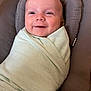baby, infant, smiling, swaddled, blanket, cushion, face, head, person, happy, comfort, indoors, portrait, baby_boy, soft_texture, resting, closeup, cute, child, wrapped
