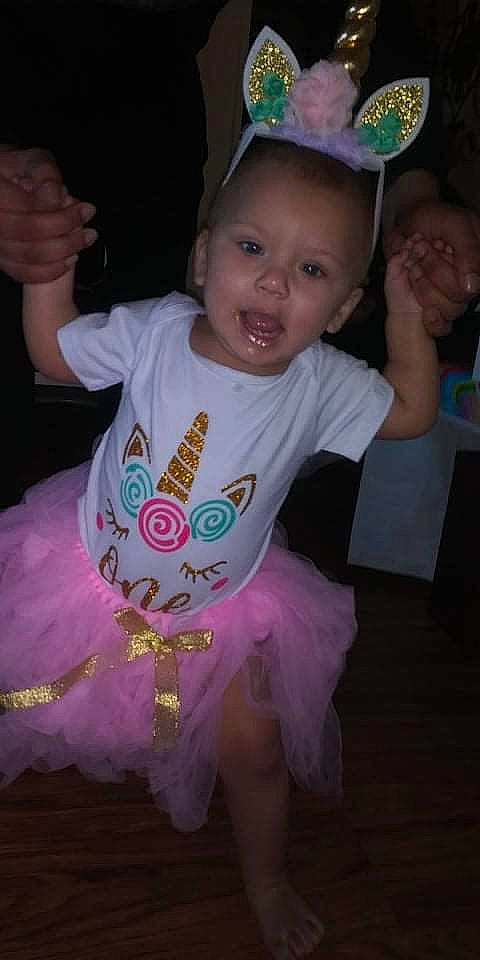 Amarianna joined the competition — help win amazing prizes! baby_toddler_clothing, child, cool, facial_expression, finger, fun, gesture, hairstyle, hand, happy, human, mammal, person, pink, product, sleeve, smile, standing, t_shirt, toddler