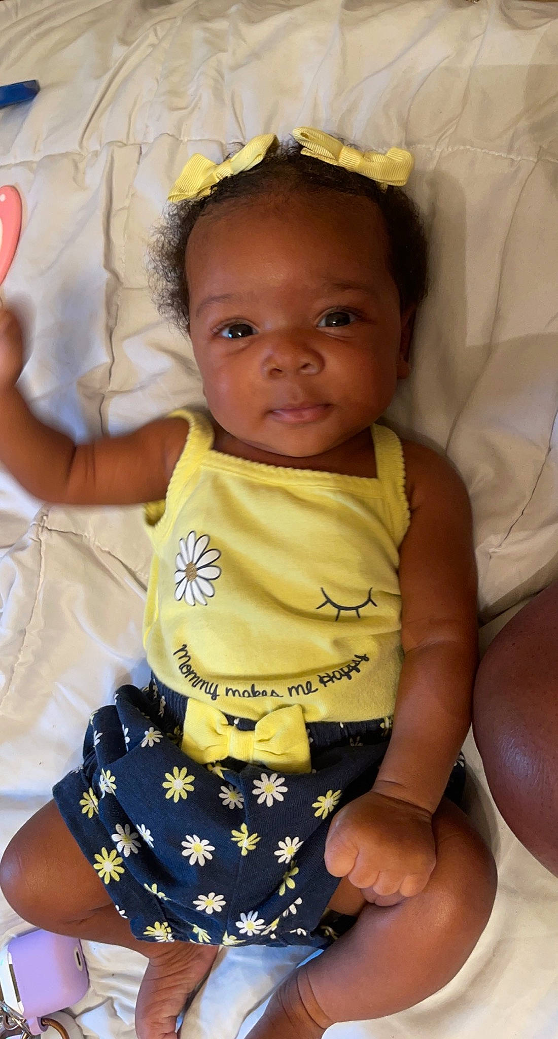 Jhamari is registered to the contest to win money with this photo: baby, baby_toddler_clothing, cheek, child, eye, eyelash, finger, fun, gesture, happy, head, neck, nose, person, product, sitting, skin, sleeve, thumb, toddler