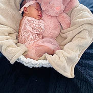 Gianna is registered to the contest to win money with this photo: baby, basket, blanket, bunny, child, cozy, cute, fabric, headband, indoor, infant, lace, nap, pink, portrait, rest, sleeping, soft, stuffed_animal, tulle