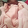 Zia joined the competition — help win amazing prizes! baby, sleeping, pink_onesie, blanket, bed, infant, cozy, soft, child, resting, peaceful, indoors, cute, person, young_child, warm, fabric, pajamas, comfort, portrait
