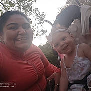 Winter joined the competition — help win amazing prizes! woman, baby, smile, stroller, outdoor, trees, headband, happy, child, nature, evening, portrait, person, young_child, casual_clothing, leaves, family, together, daylight, photography