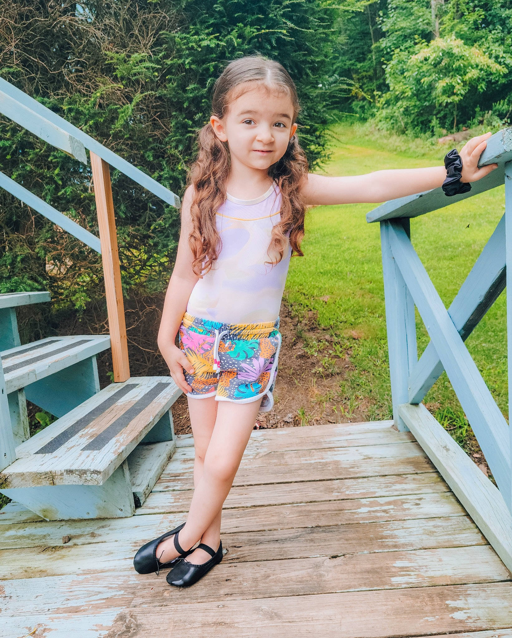 Brayleigh is registered to the contest to win money with this photo: abdomen, brown_hair, electric_blue, fence, foot, fun, grass, happy, human_leg, joy, leg, leisure, people_in_nature, person, plant, recreation, swimwear, thigh, tree, trunk