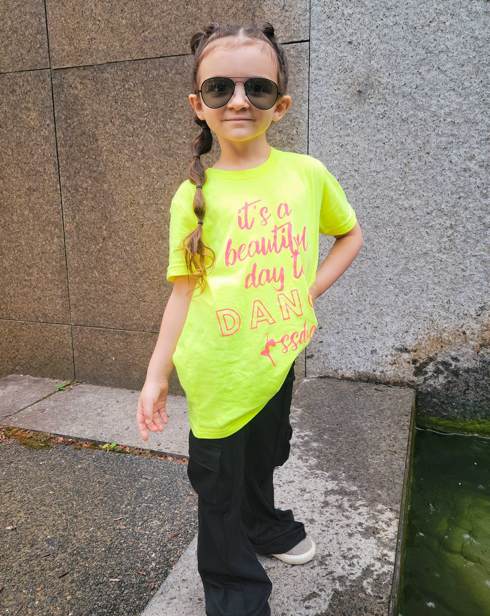 Brayleigh is registered to the contest to win money with this photo: asphalt, cool, eyewear, face, fashion_design, glasses, goggles, happy, joy, knee, leisure, person, personal_protective_equipment, road_surface, sleeve, smile, sportswear, sunglasses, t_shirt, thigh