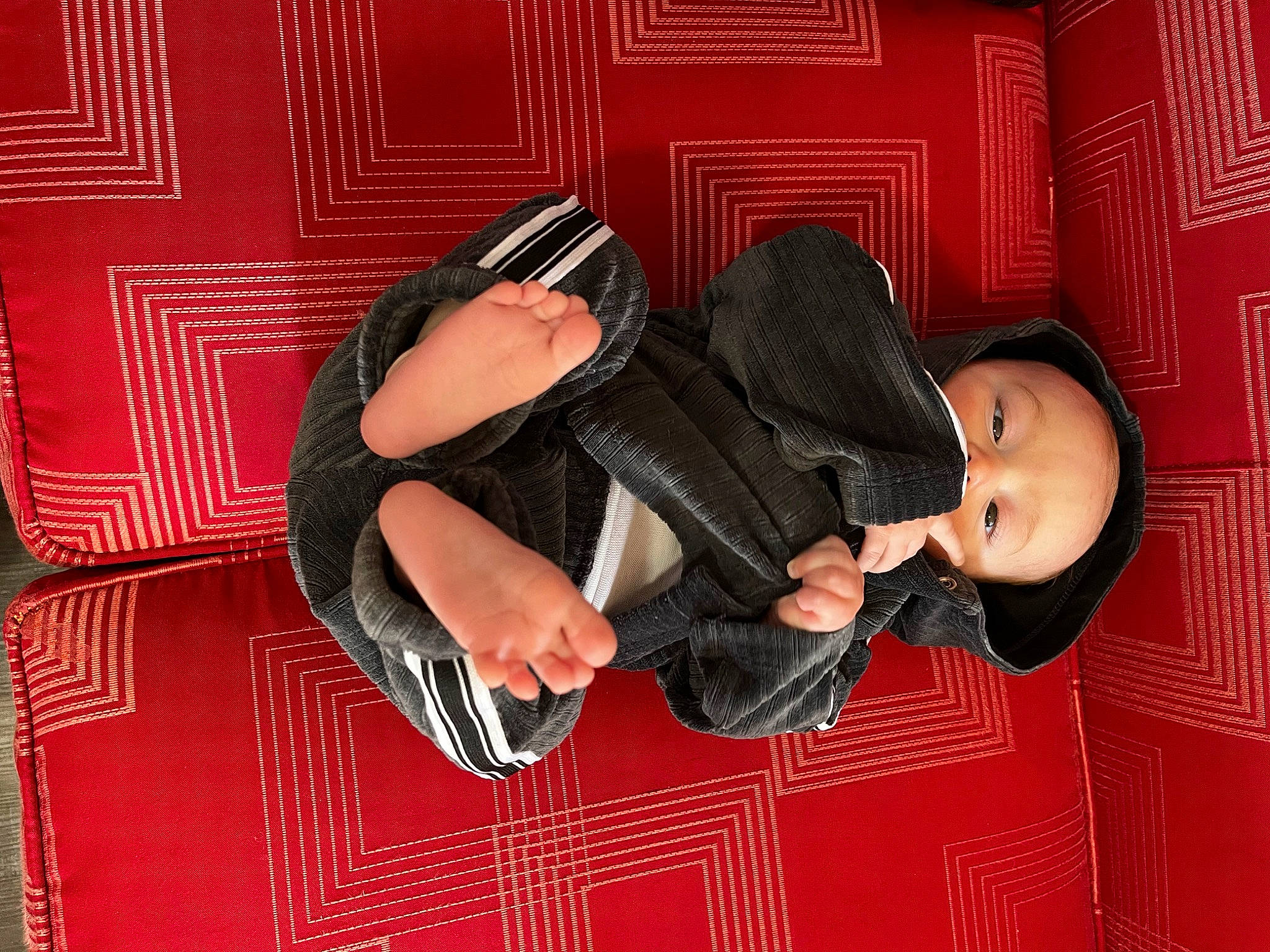 Marcie joined the competition — help win amazing prizes! audio_equipment, bag, black_hair, comfort, costume, flash_photography, flooring, foot, fun, human_leg, knee, luggage_and_bags, magenta, pattern, person, room, sandal, sitting, thigh