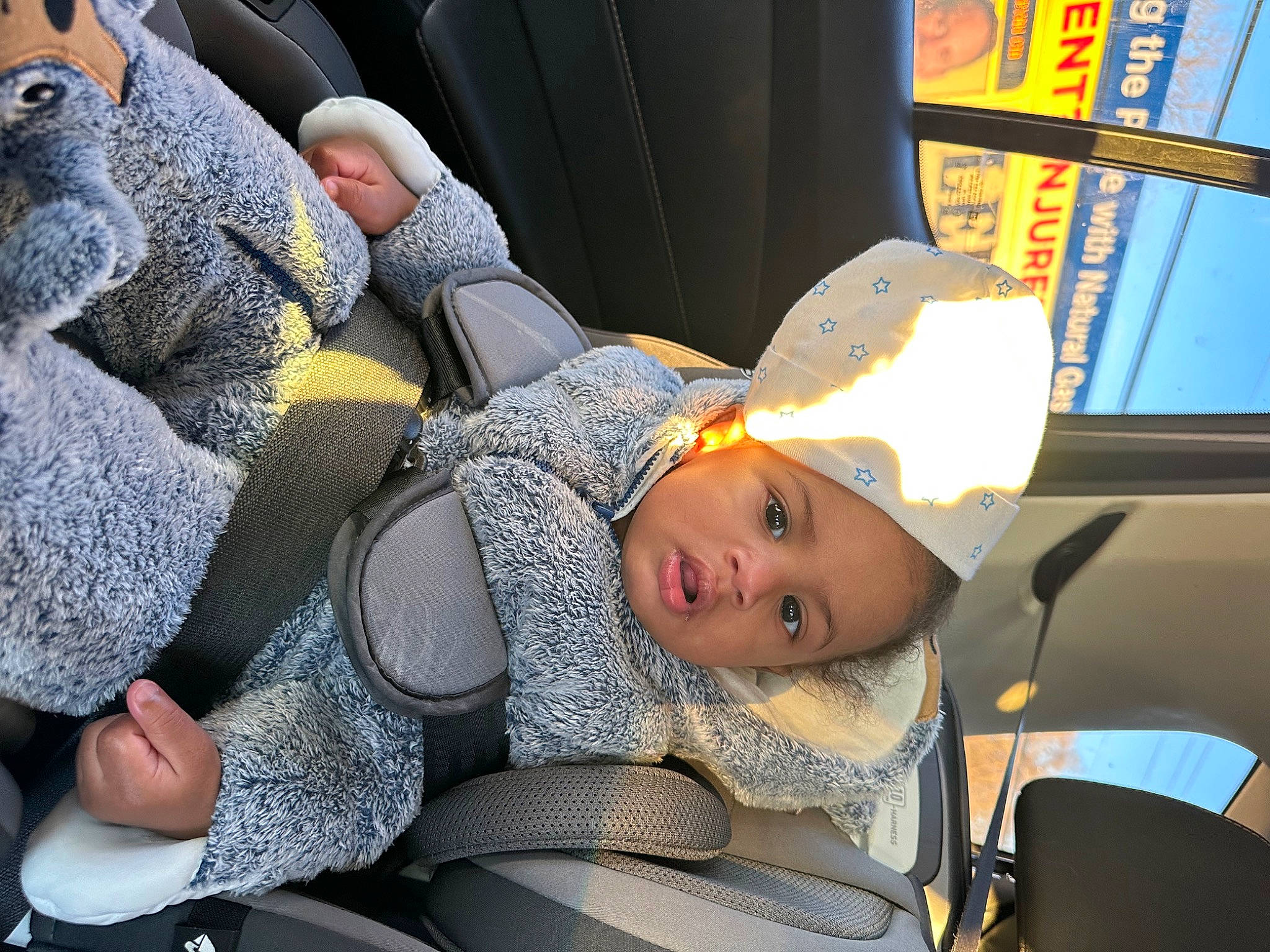 Jayce is registered to the contest to win money with this photo: auto_part, baby, baby_carriage, baby_in_car_seat, baby_products, car_seat, car_seat_cover, child, comfort, family_car, head_restraint, lap, luxury_vehicle, motor_vehicle, nap, person, seat_belt, sitting, toddler, vehicle_door