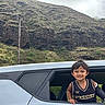 Weston Aydyn joined the competition — help win amazing prizes! car, cast, casual_clothing, child, cloudy, daytime, greenery, happy, hill, mountain, nature, outdoor, person, portrait, power_lines, scenic, smiling, vehicle, window, young_child