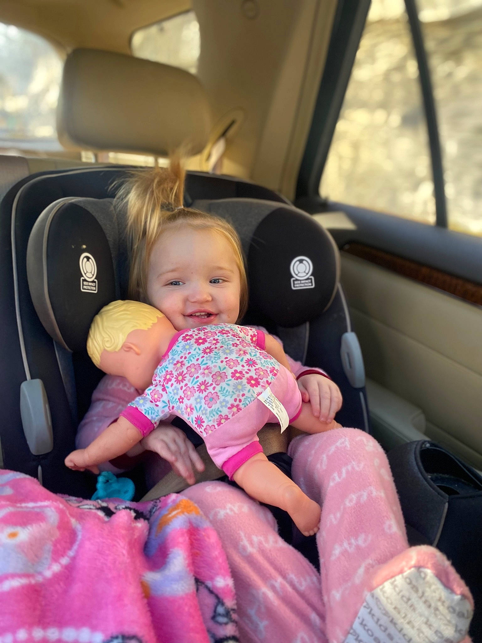 Riley joined the competition — help win amazing prizes! auto_part, automotive_design, automotive_exterior, baby, baby_in_car_seat, baby_toddler_clothing, car, car_seat, car_seat_cover, comfort, head_restraint, motor_vehicle, person, personal_luxury_car, sock, steering_part, steering_wheel, thigh, toddler, vehicle