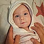 baby, blanket, blue_eyes, child, closeup, comfort, cute, face, gentle, hands, hood, indoor, infant, newborn, person, portrait, skin, soft_texture, towel, wrapped