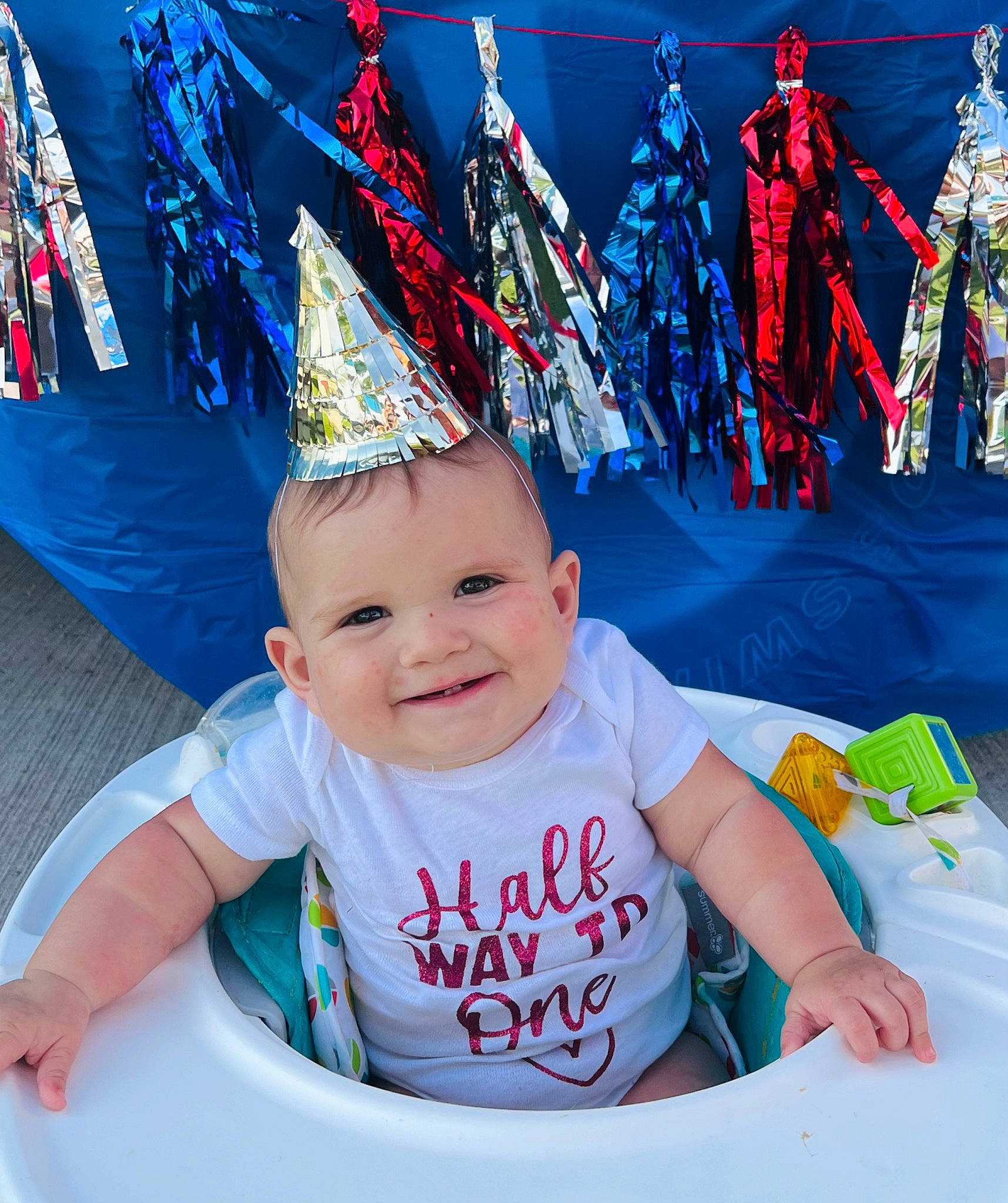 Londyn is registered to the contest to win money with this photo: baseball_cap, blue, cap, child, costume_hat, fun, happy, headgear, joy, leisure, party_hat, party_supply, people, person, photograph, pink, product, recreation, red, smile