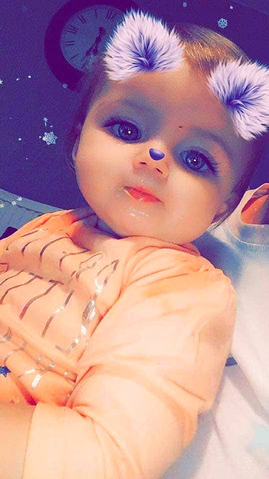 Rosie is registered to the contest to win money with this photo: baby, cheek, child, child_model, ear, eye, eyebrow, eyelash, face, forehead, hair, hairstyle, head, iris, lip, nose, person, pink, skin, toddler