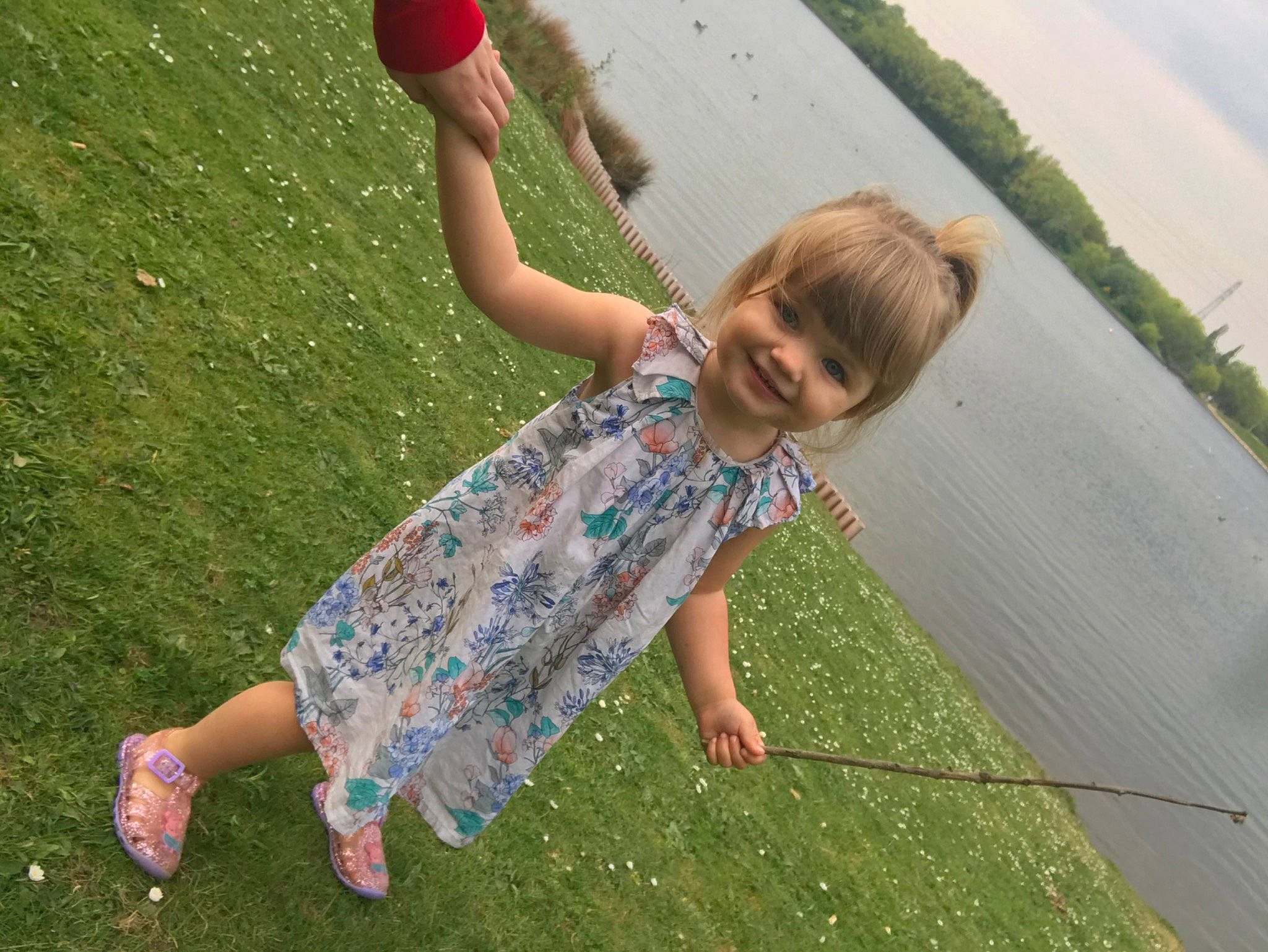 Rosie is registered to the contest to win money with this photo: child, fun, grass, grass_family, happy, joy, lawn, leisure, person, plant, play, summer, toddler, tree, vacation, water