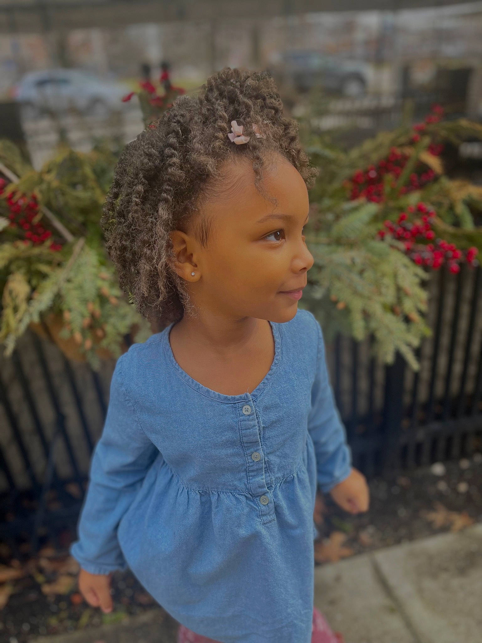 Jada joined the competition — help win amazing prizes! baby_toddler_clothing, eye, face, facial_expression, fence, grass, hair, hairstyle, happy, head, neck, people_in_nature, person, plant, shoulder, skin, sleeve, smile, standing, toddler