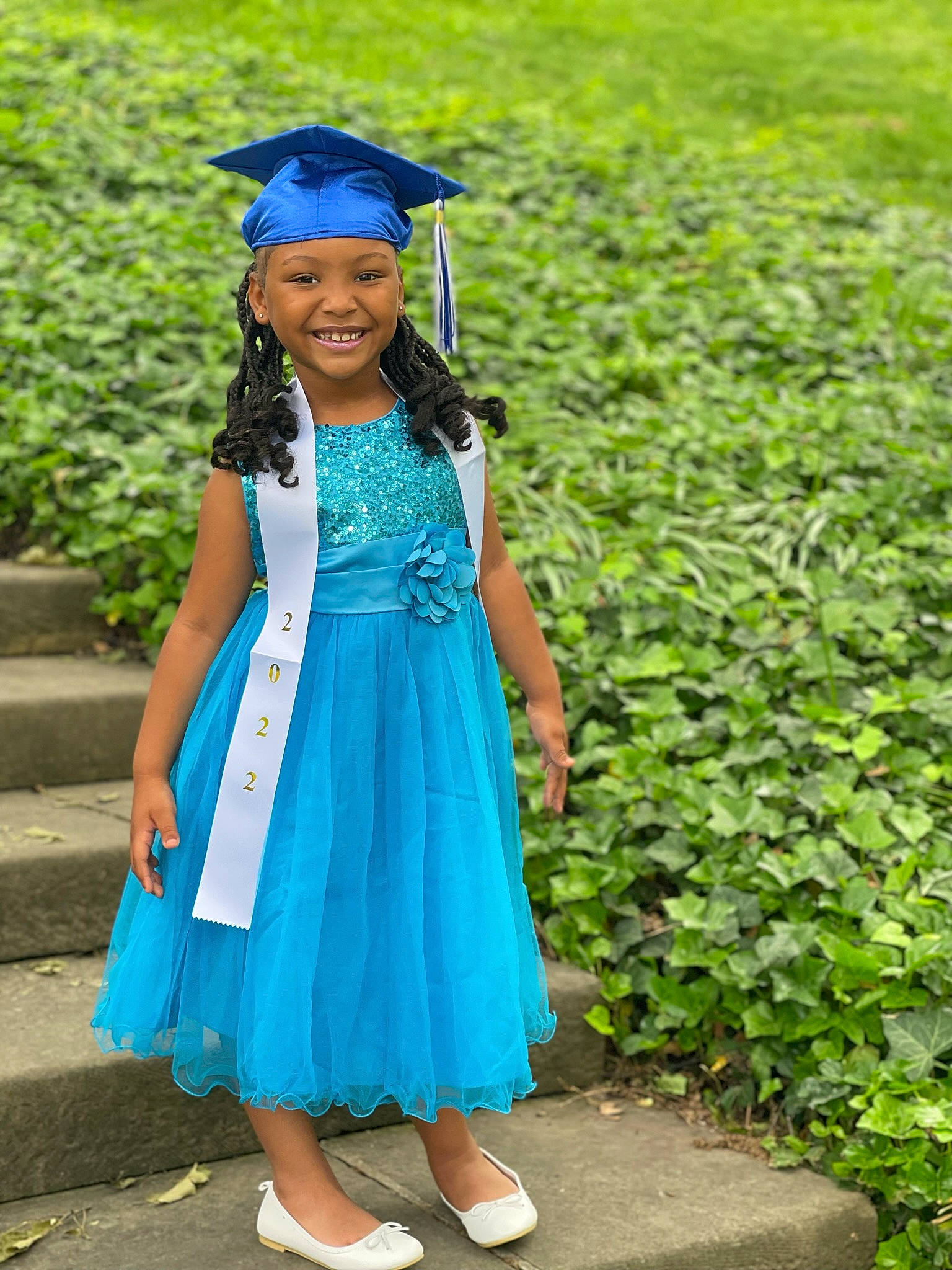 Jada joined the competition — help win amazing prizes! academic_dress, day_dress, dress, electric_blue, event, eye, face, fashion_design, formal_wear, fun, graduation, grass, happy, headgear, headwear, joy, long_hair, mortarboard, outerwear, person